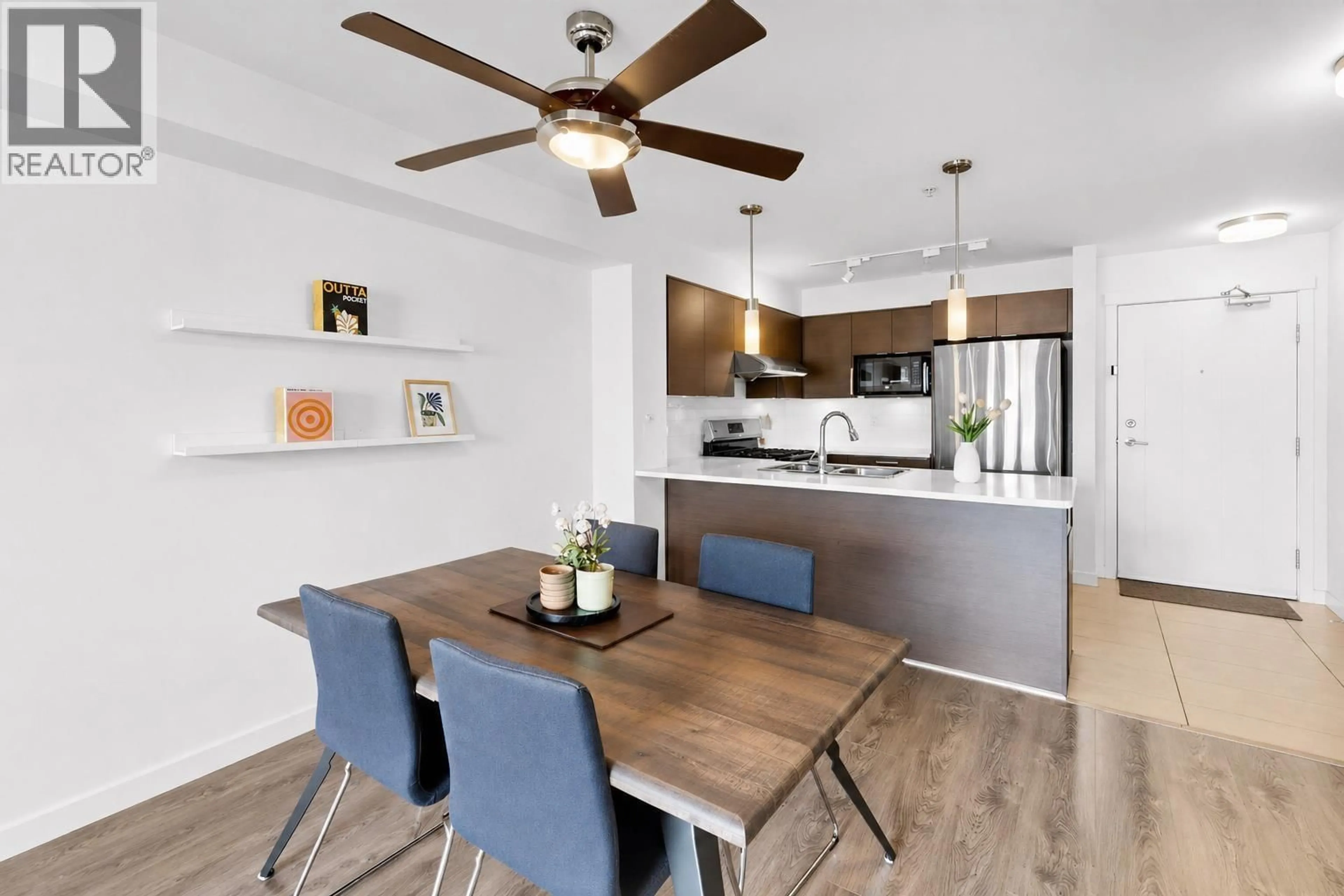 Open concept kitchen, wood/laminate floor for 205 - 12339 STEVESTON HIGHWAY, Richmond British Columbia V6W0B4
