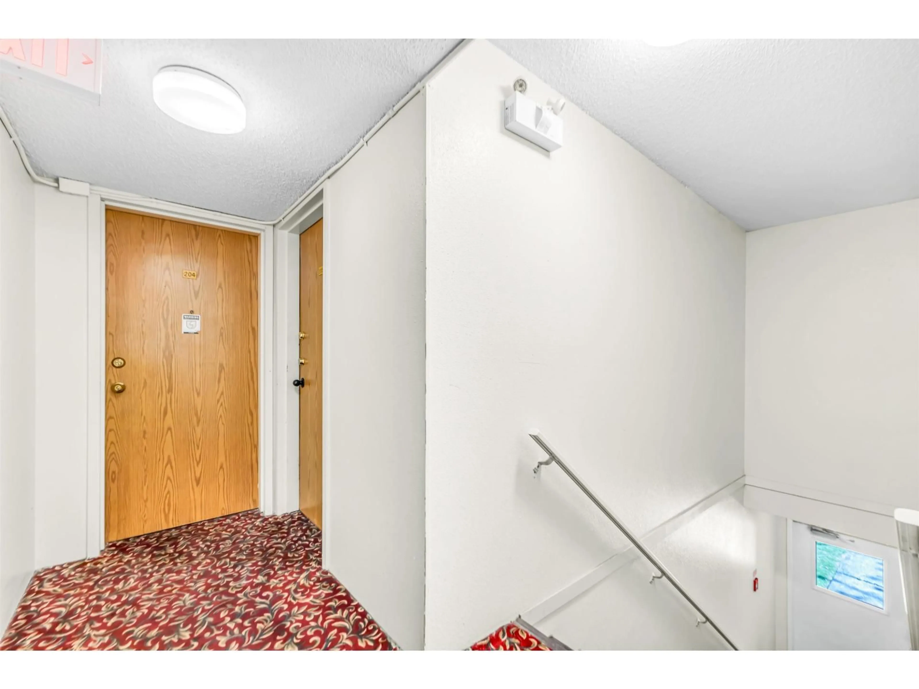 Indoor foyer for 204 - 7119 133 STREET, Surrey British Columbia V3W7Z6