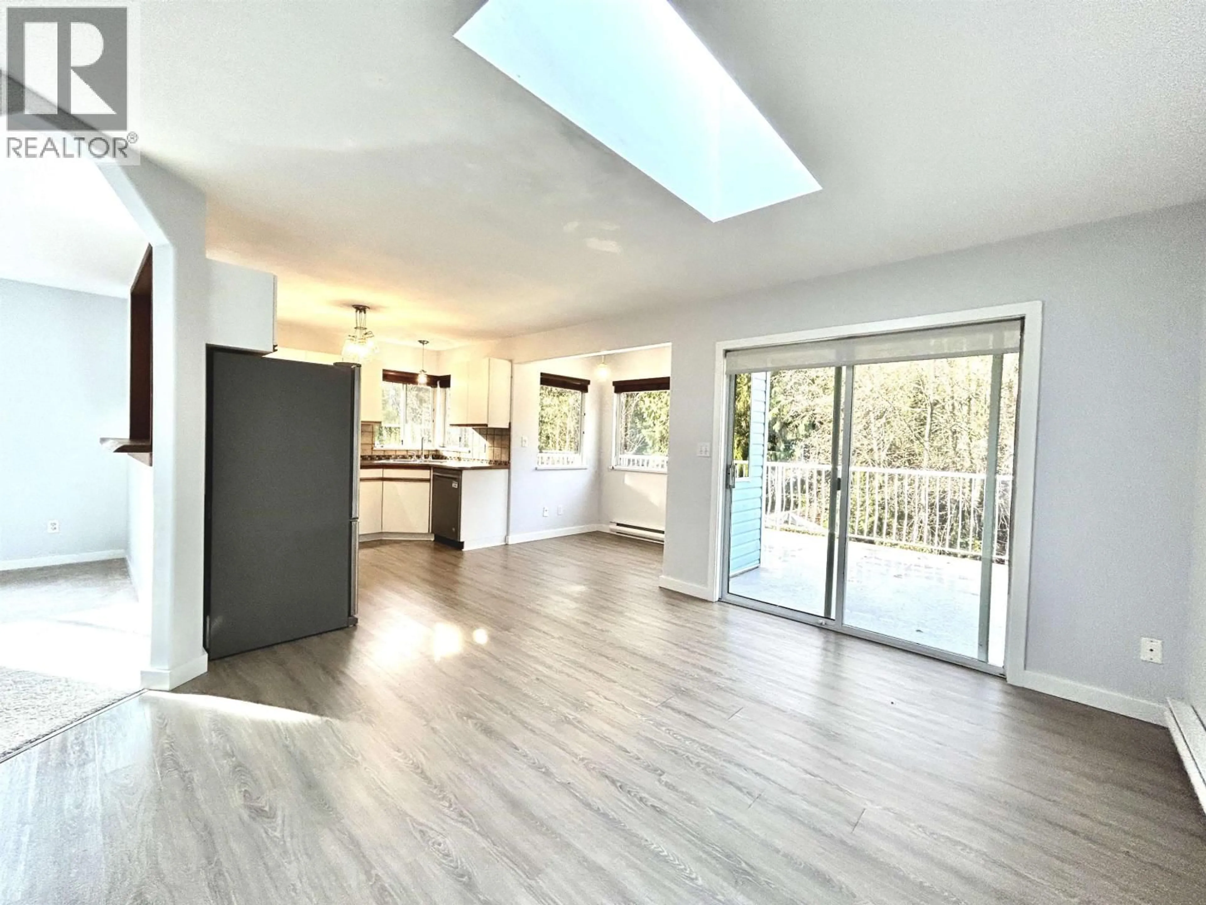 Open concept kitchen, wood/laminate floor for 1705 YMCA ROAD, Langdale British Columbia V0N1V6