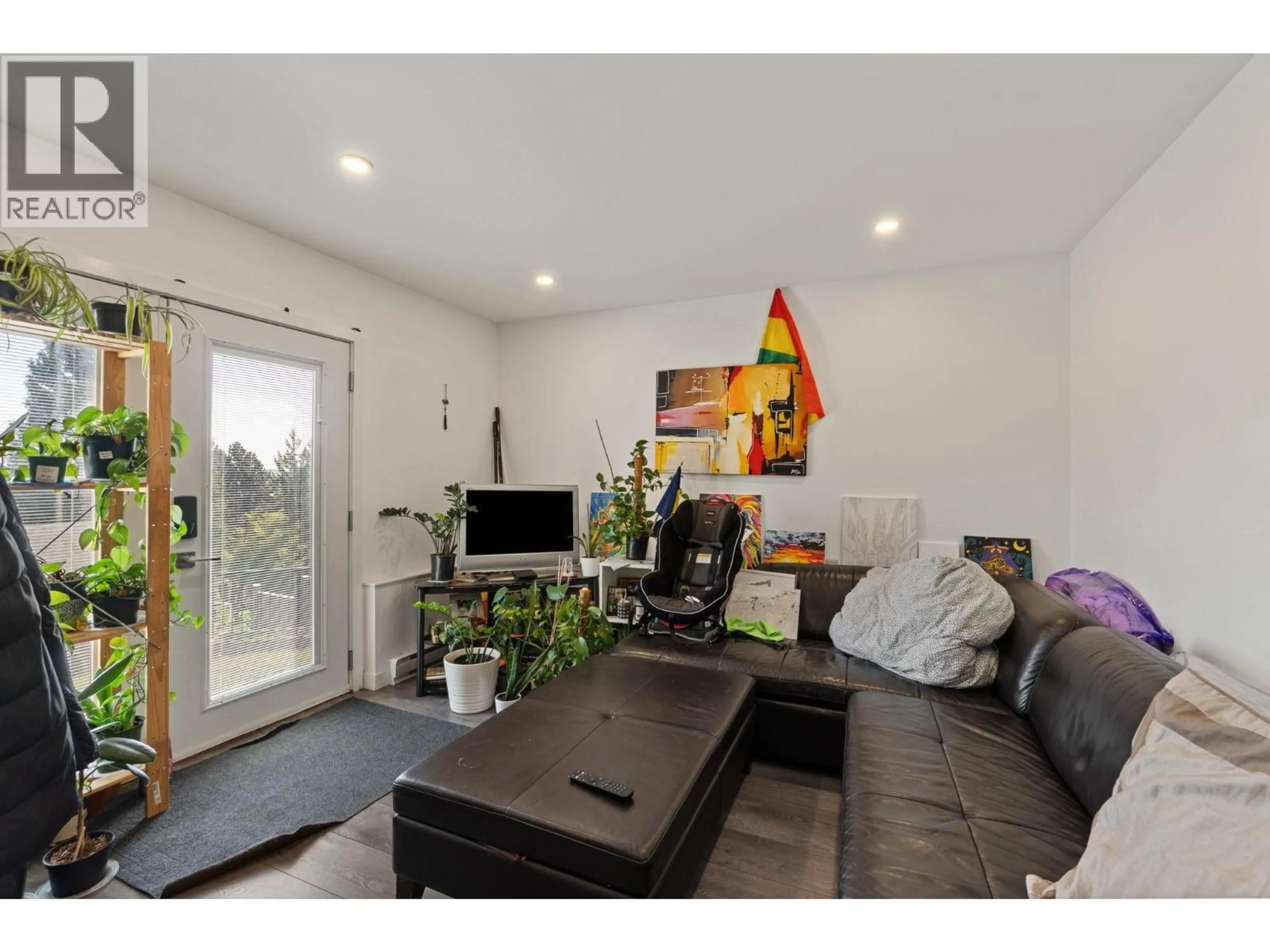 Living room with furniture, wood/laminate floor for 149 MUNDY STREET, Coquitlam British Columbia V3K6E5