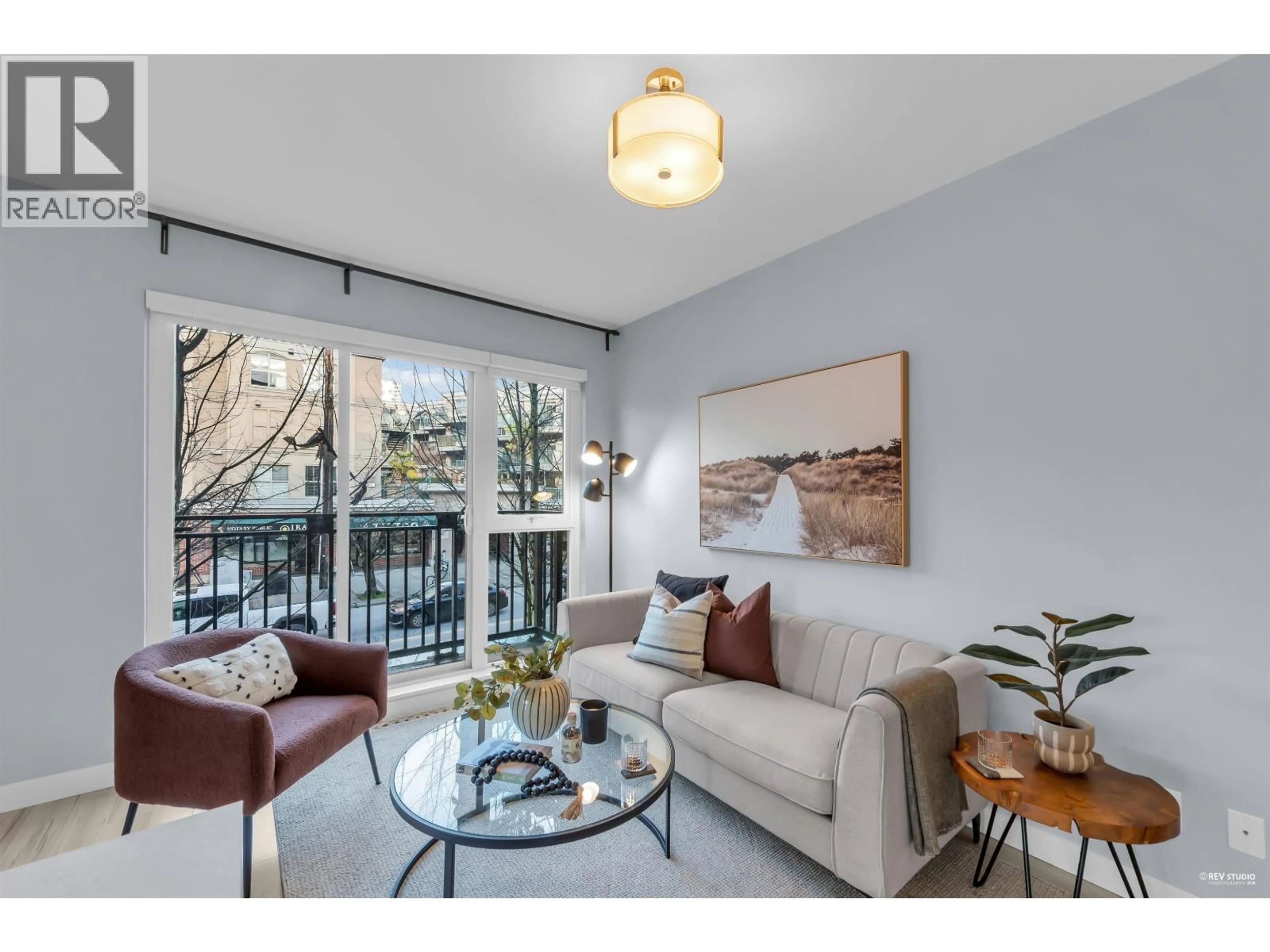 Living room with furniture, unknown for 207 - 111 3RD STREET, North Vancouver British Columbia V7L0C6