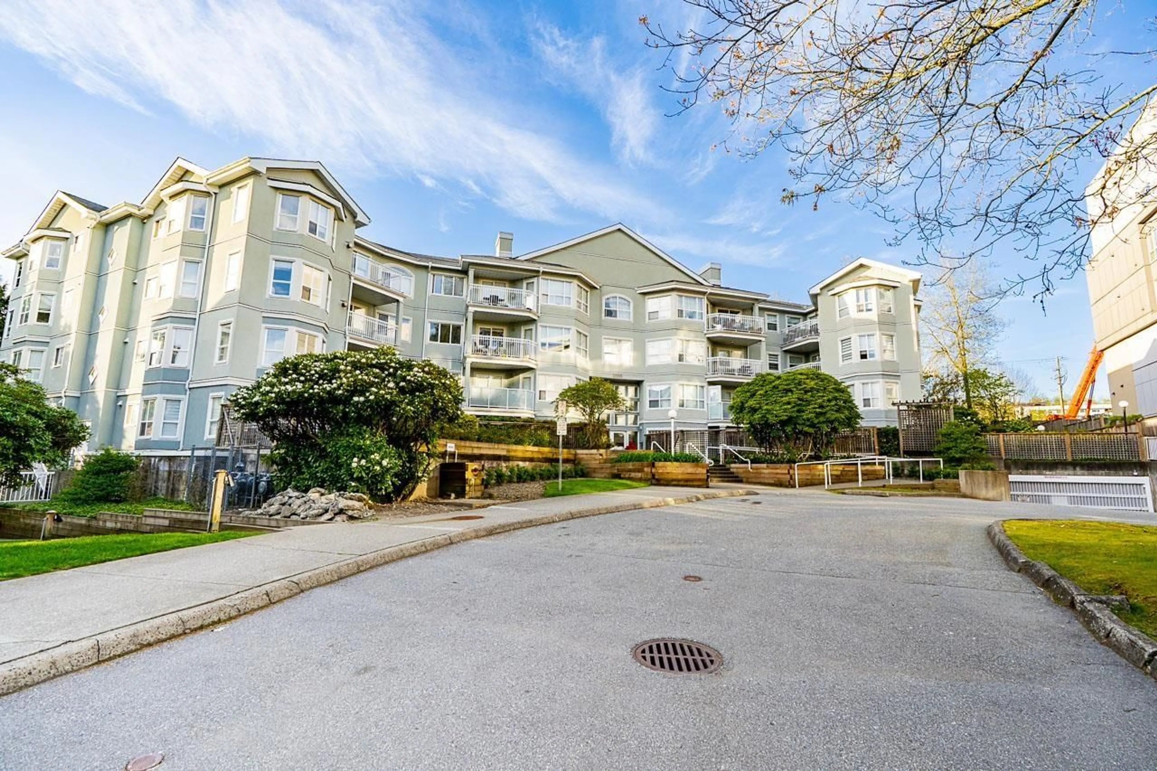 A pic from outside/outdoor area/front of a property/back of a property/a pic from drone, water/lake/river/ocean view for 104 - 13955 LAUREL DRIVE, Surrey British Columbia V3T1A8