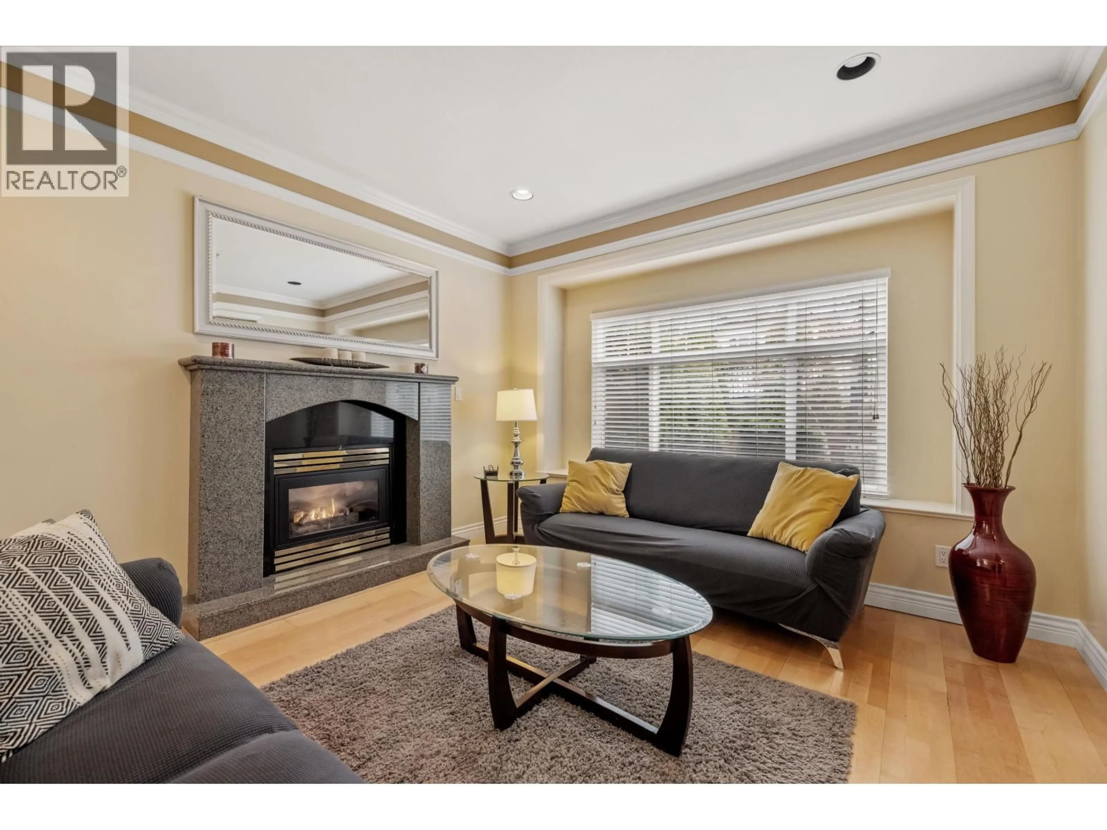 Living room with furniture, wood/laminate floor for 1788 64TH AVENUE, Vancouver British Columbia V5P2M7