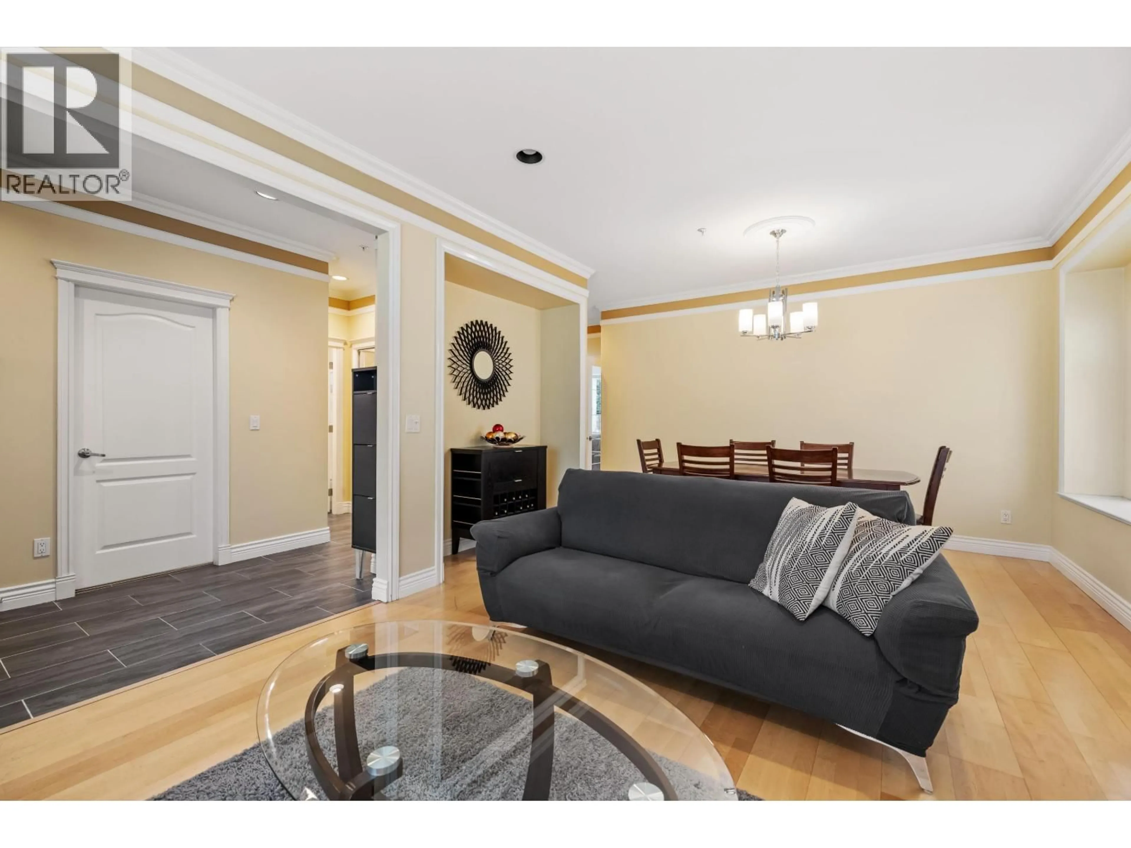 Living room with furniture, wood/laminate floor for 1788 64TH AVENUE, Vancouver British Columbia V5P2M7