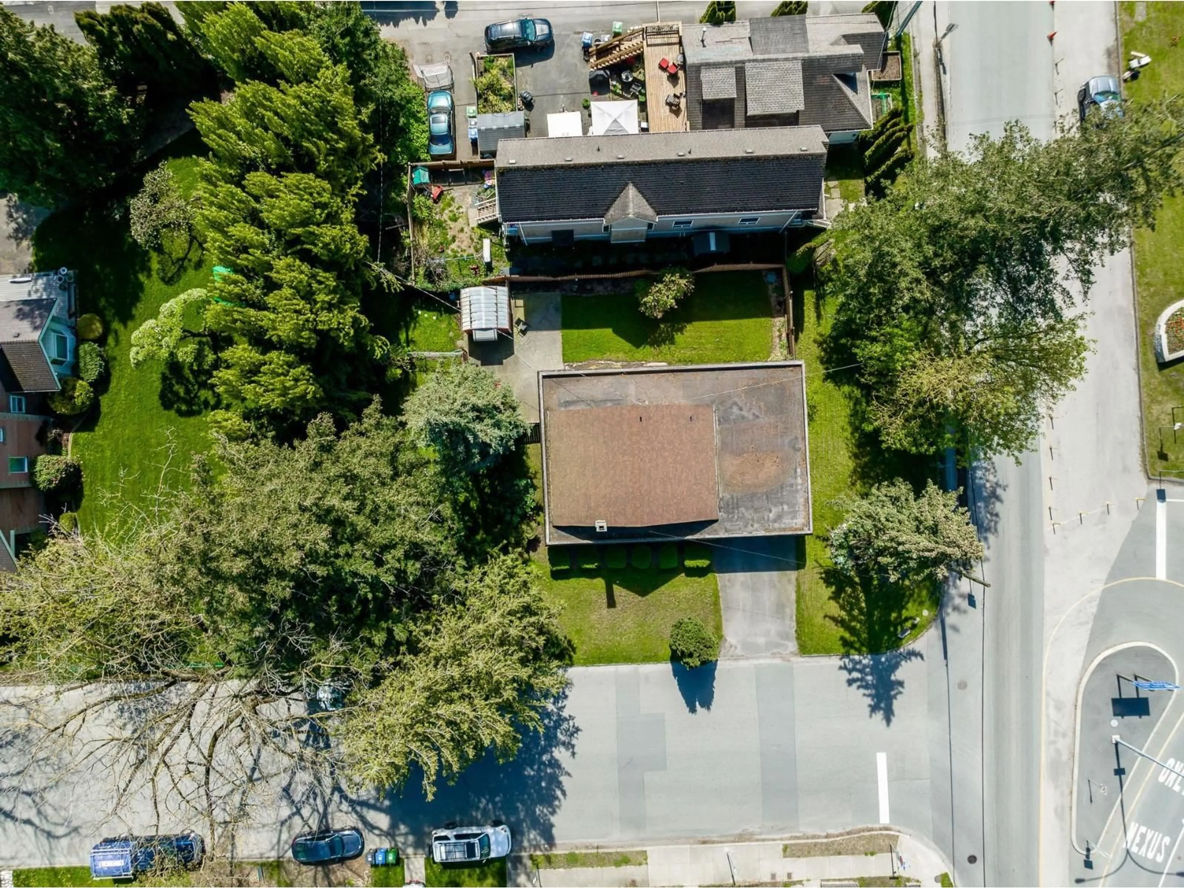A pic from outside/outdoor area/front of a property/back of a property/a pic from drone, street for 34612 2 STREET, Abbotsford British Columbia V2S8C2