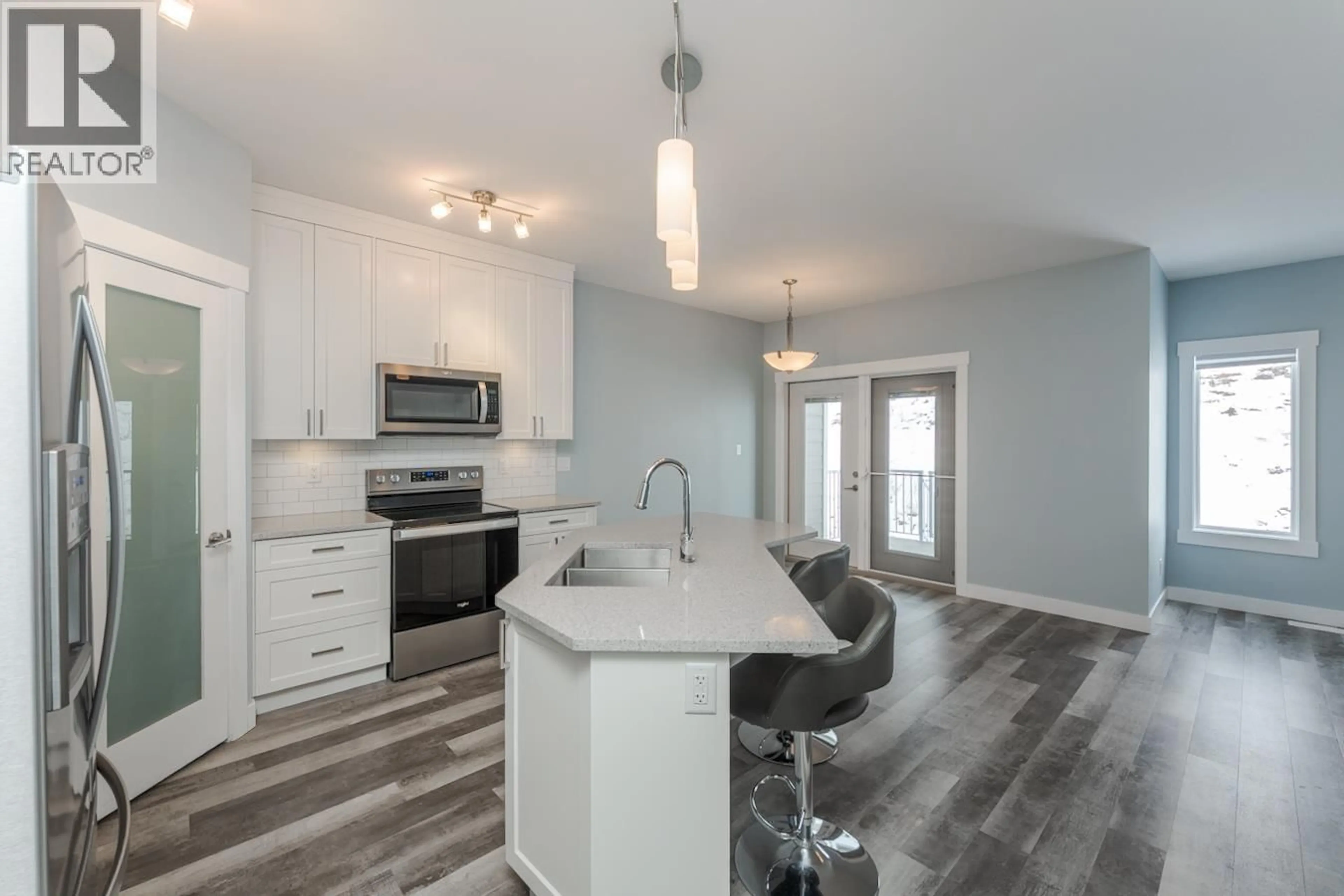 Open concept kitchen, unknown for 402 - 2425 ROWE STREET, Prince George British Columbia V2N0J3