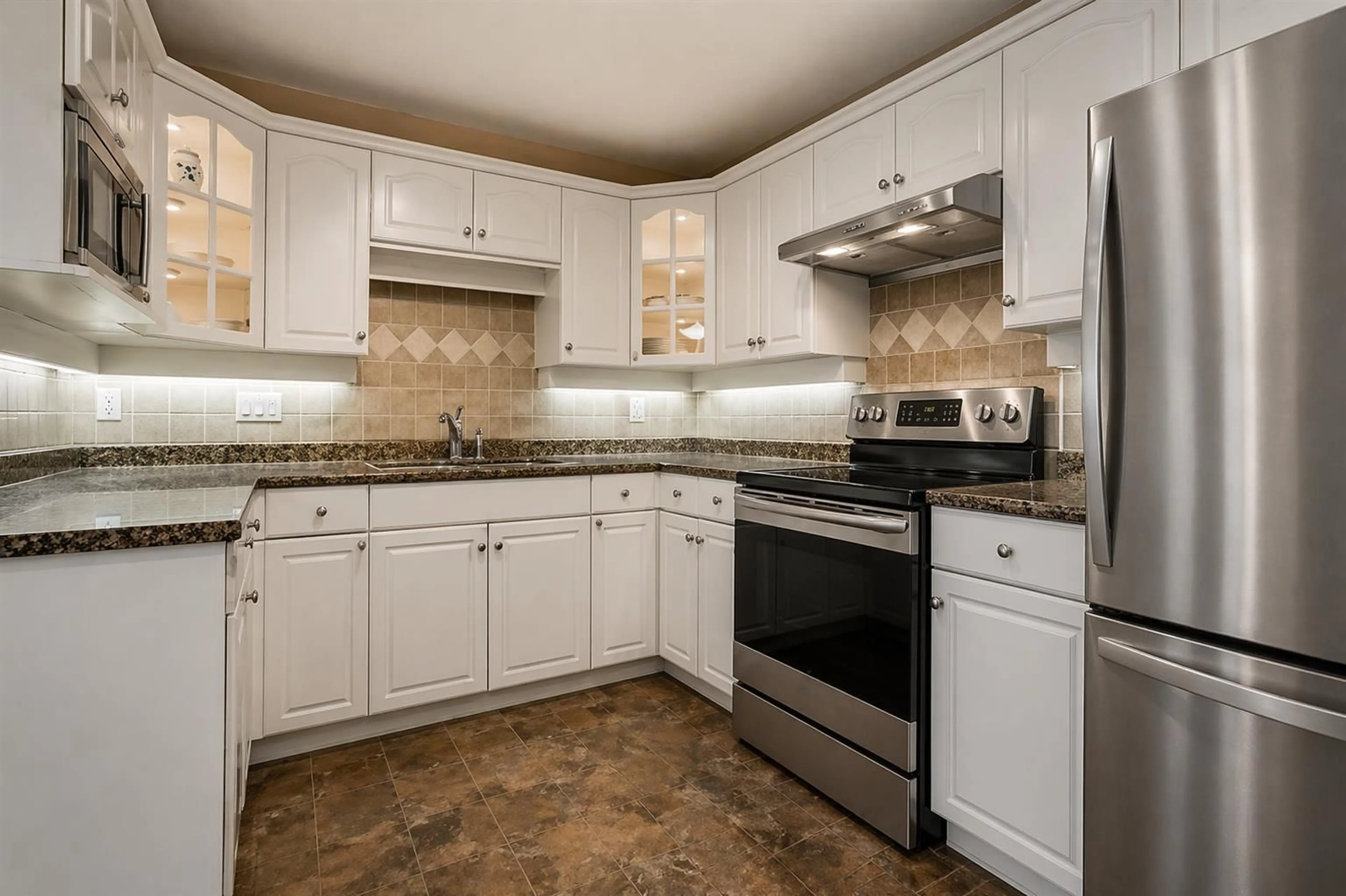 Standard kitchen, ceramic/tile floor for 203 - 17740 58A AVENUE, Surrey British Columbia V3S8M5