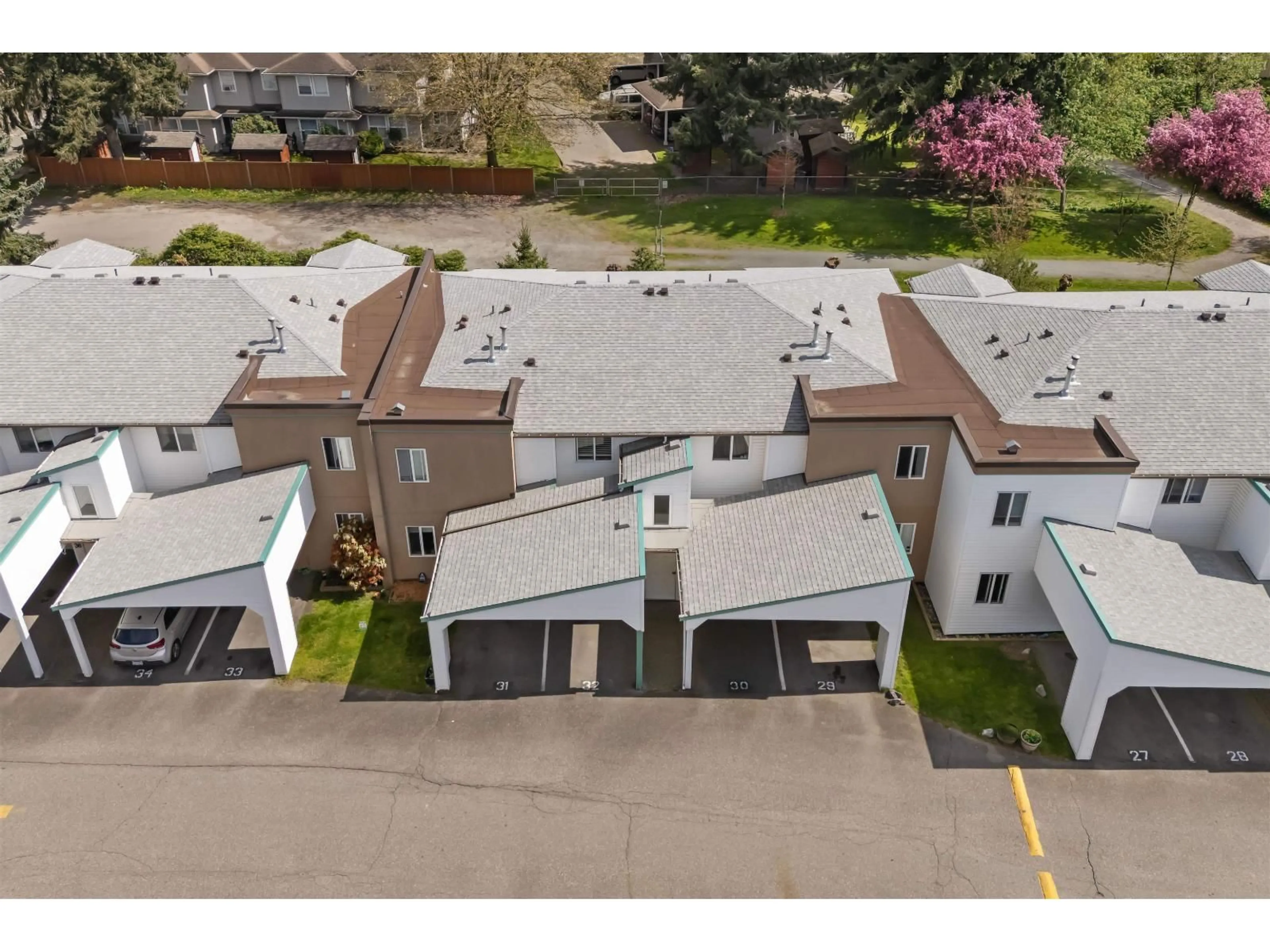 A pic from outside/outdoor area/front of a property/back of a property/a pic from drone, street for 30 - 7715 LUCKAKUCK PLACE, Chilliwack British Columbia V2R3N6
