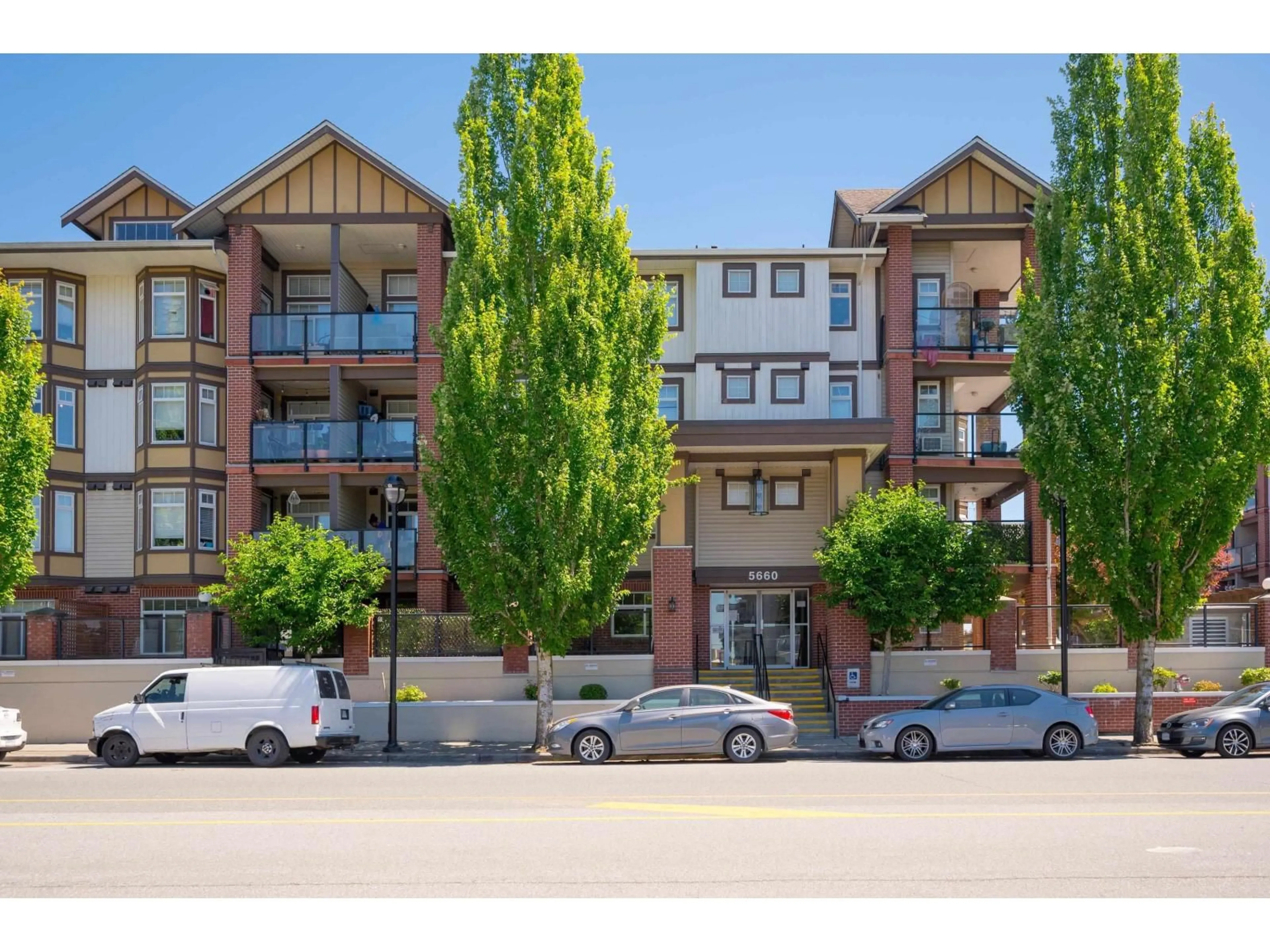 A pic from outside/outdoor area/front of a property/back of a property/a pic from drone, street for 243 - 5660 201A STREET, Langley British Columbia V3A4E6