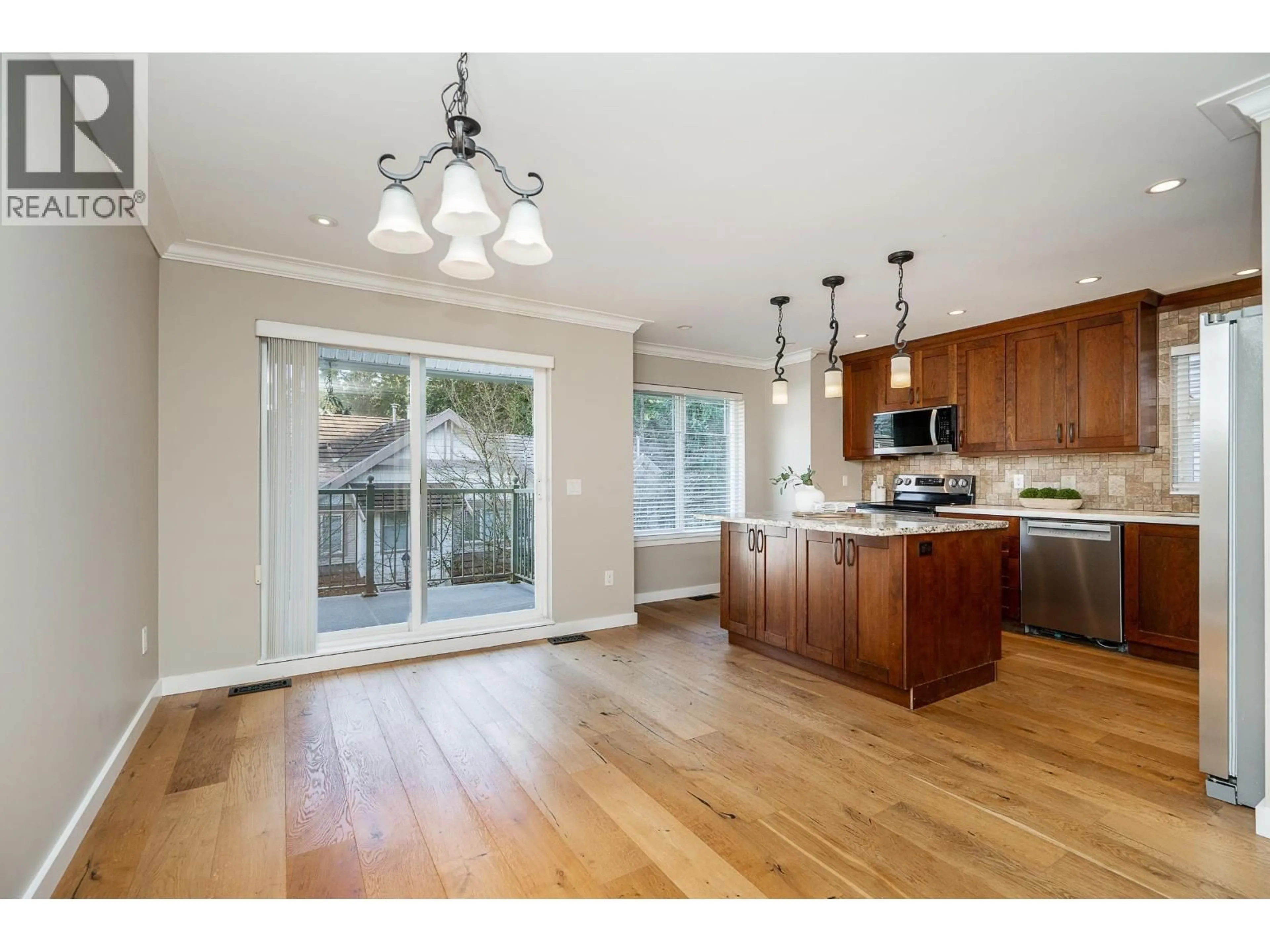 Open concept kitchen, wood/laminate floor for 5 - 2351 PARKWAY BOULEVARD, Coquitlam British Columbia V3E3P2