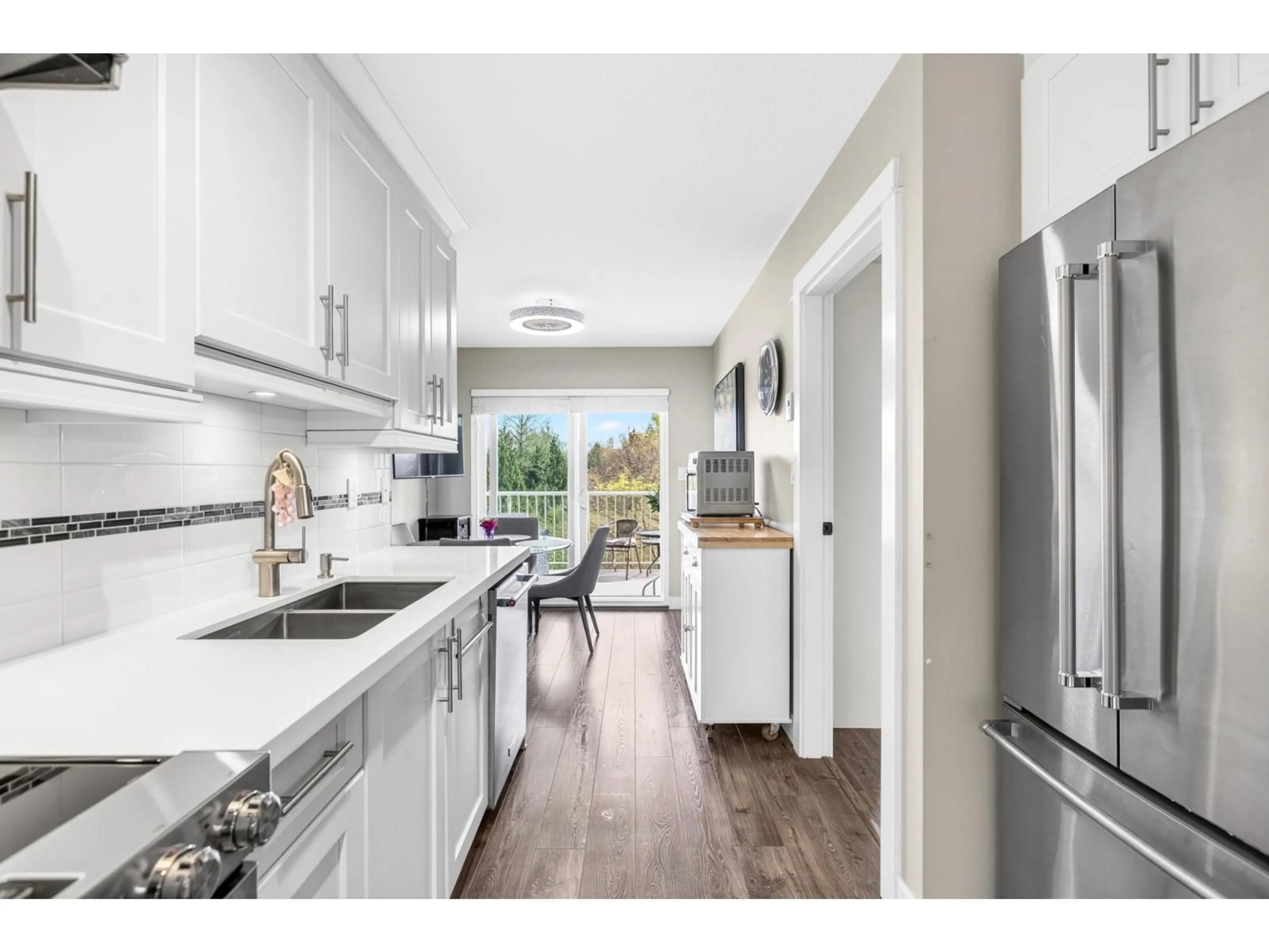 Open concept kitchen, unknown for 212 - 20600 53A AVENUE, Langley British Columbia V3A8C2