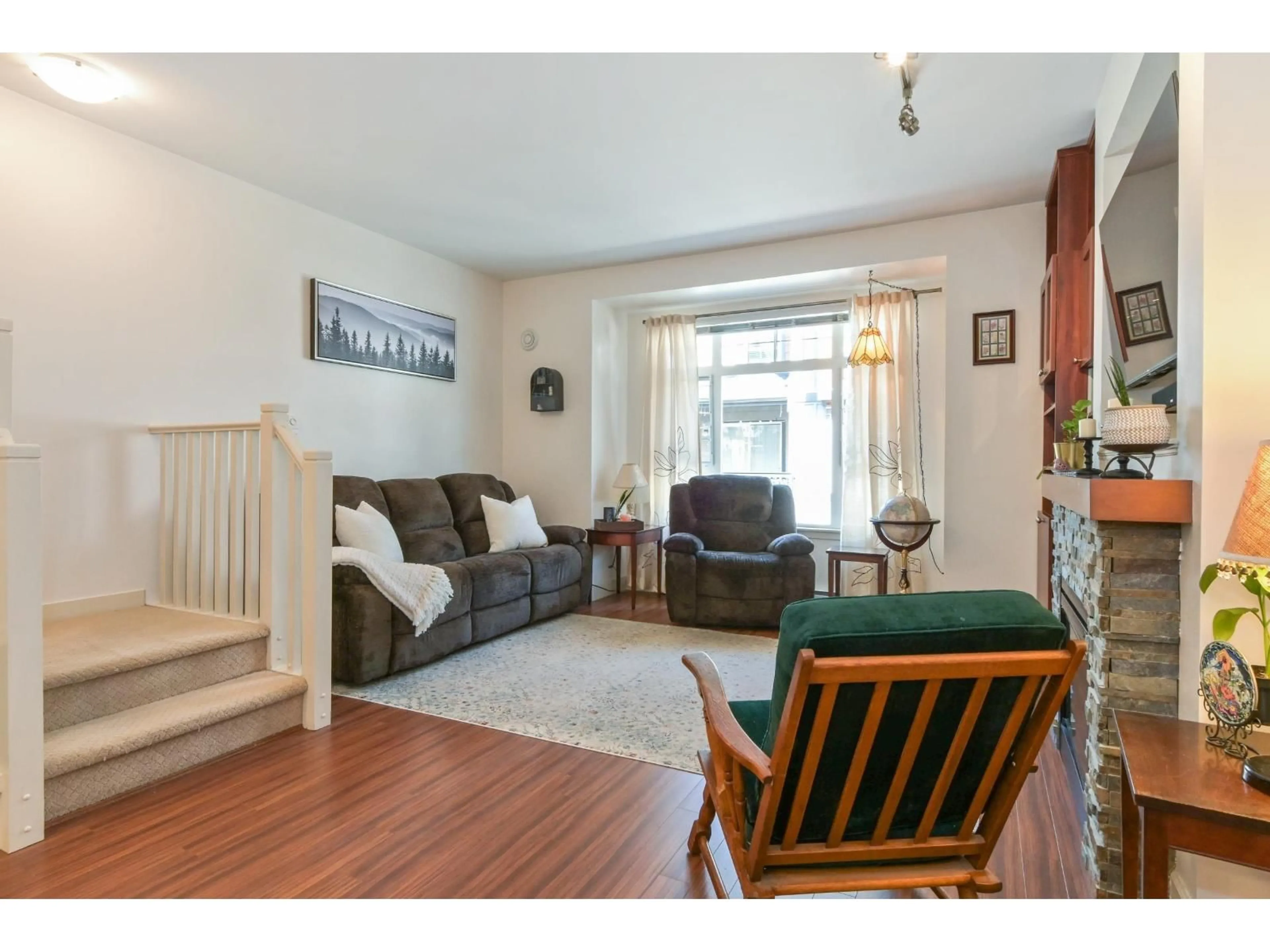 Living room with furniture, wood/laminate floor for 91 - 2979 156 STREET, Surrey British Columbia V3Z8V8