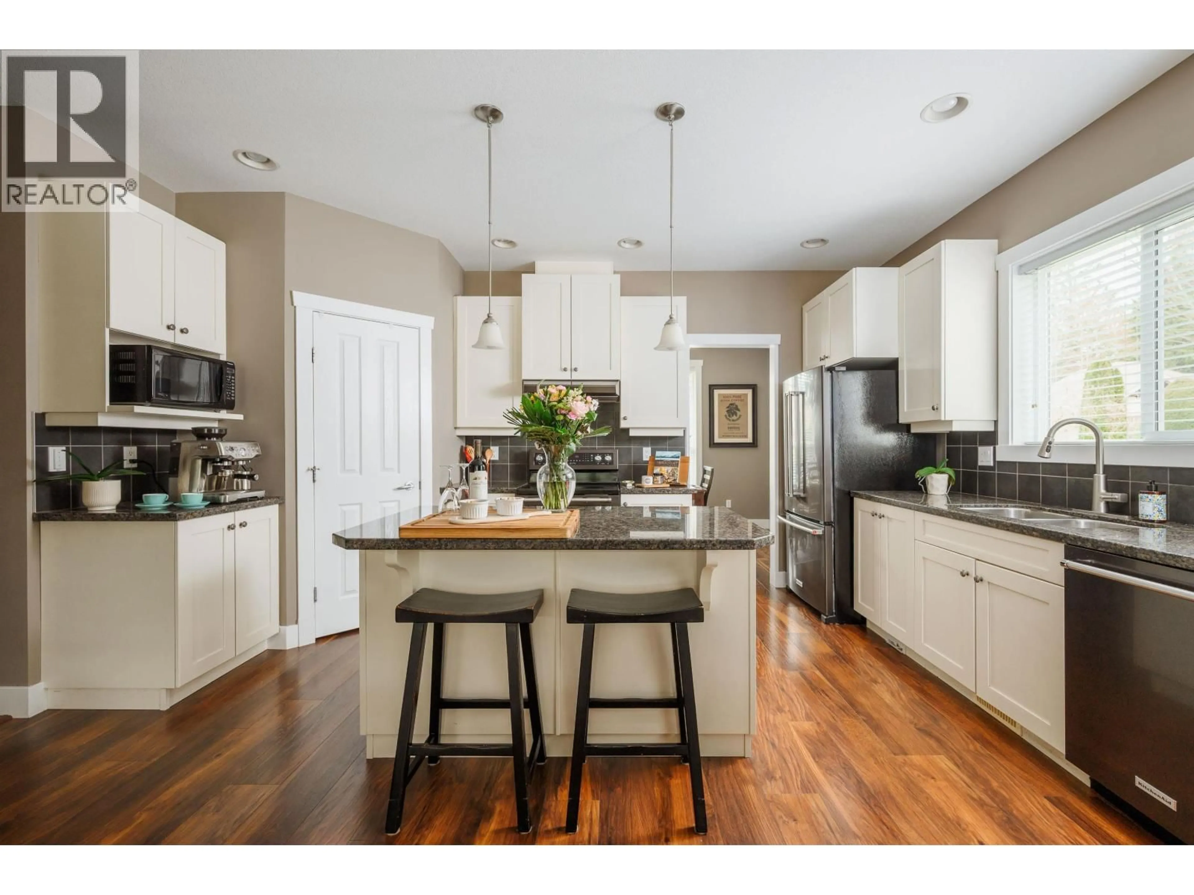 Open concept kitchen, wood/laminate floor for 22840 FOREMAN DRIVE, Maple Ridge British Columbia V4R0B2