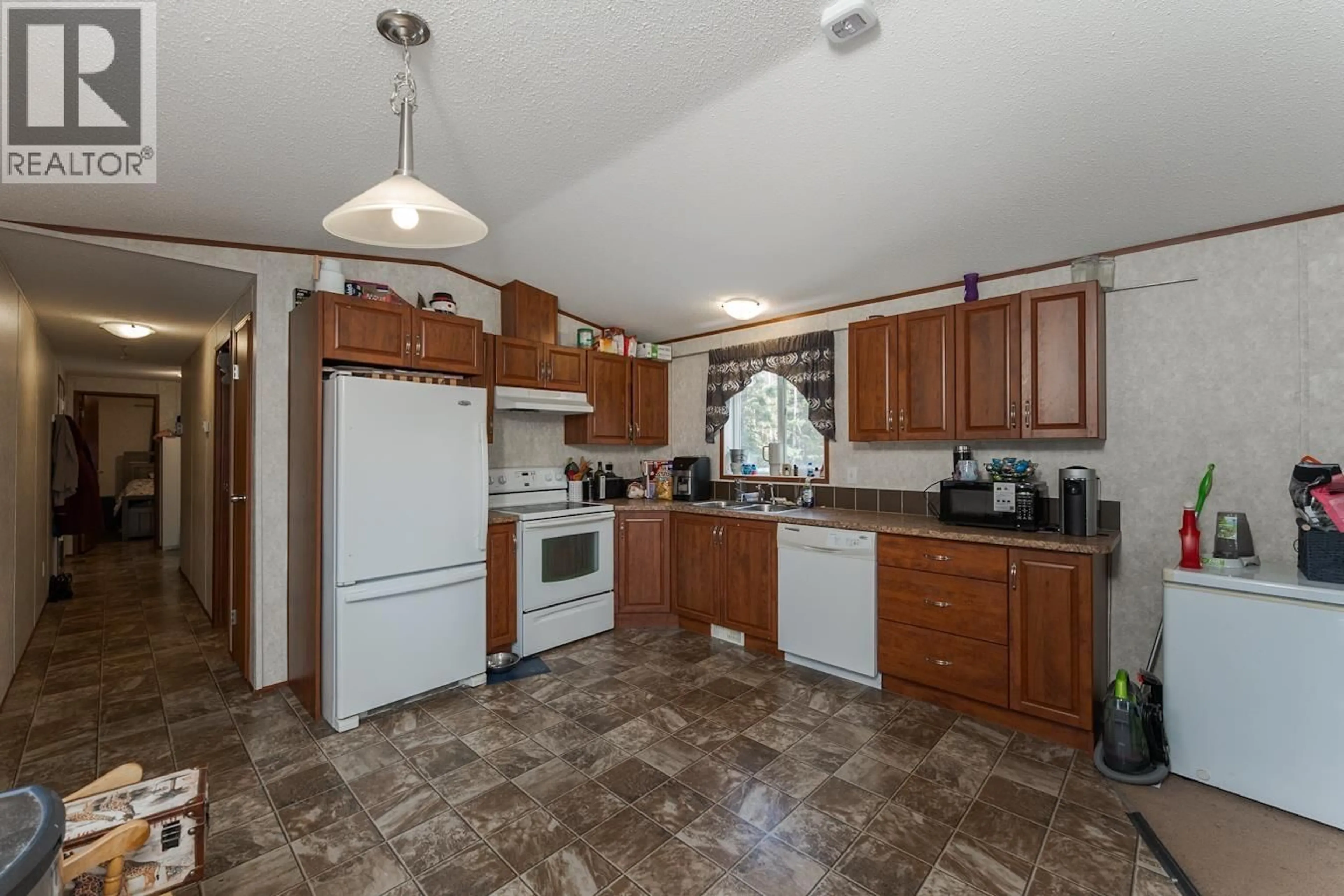Standard kitchen, ceramic/tile floor for 7235 TAFT DRIVE, Prince George British Columbia V2K2R4