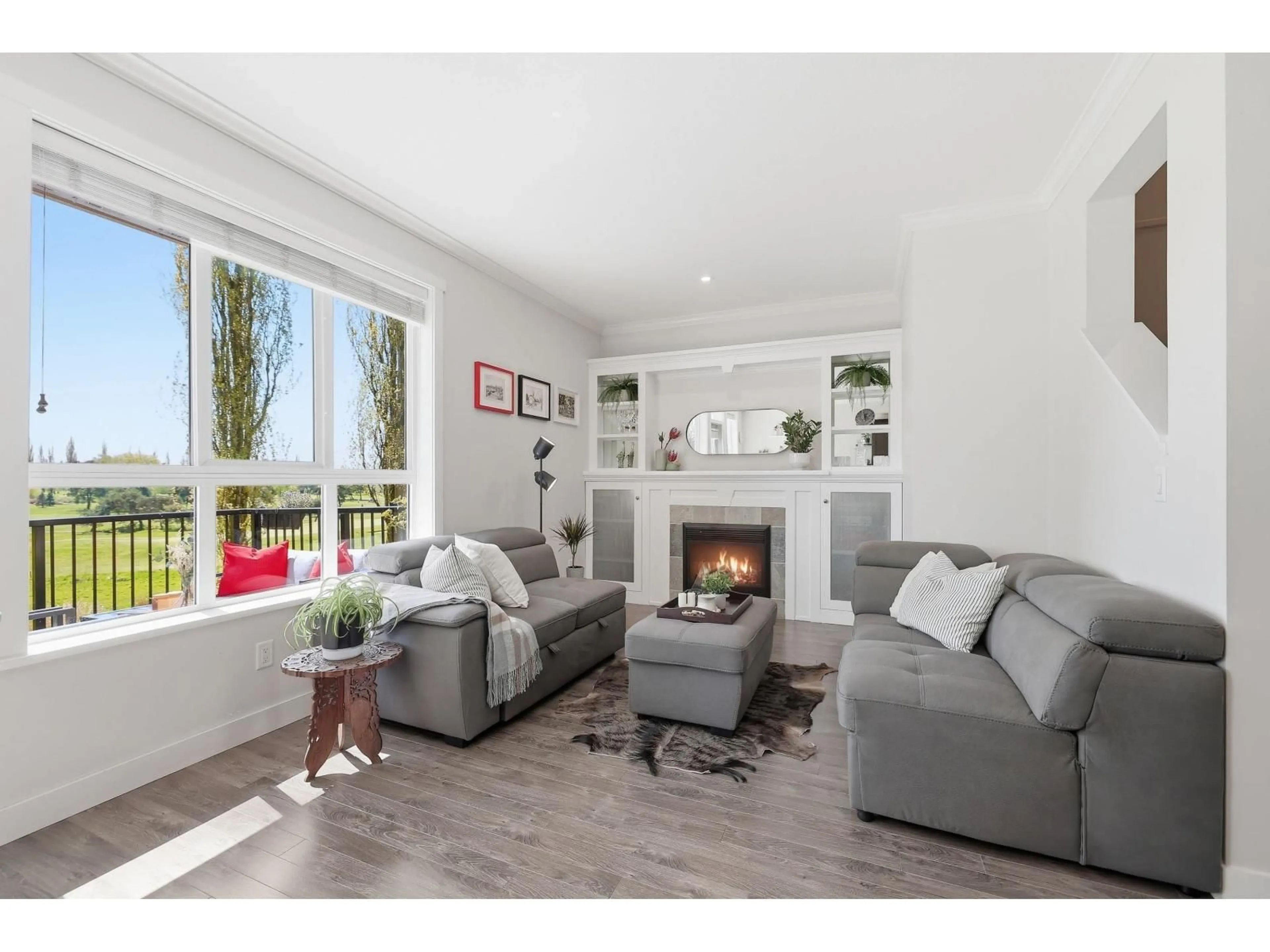 Living room with furniture, wood/laminate floor for 82 - 7780 170 STREET, Surrey British Columbia V4N6M4