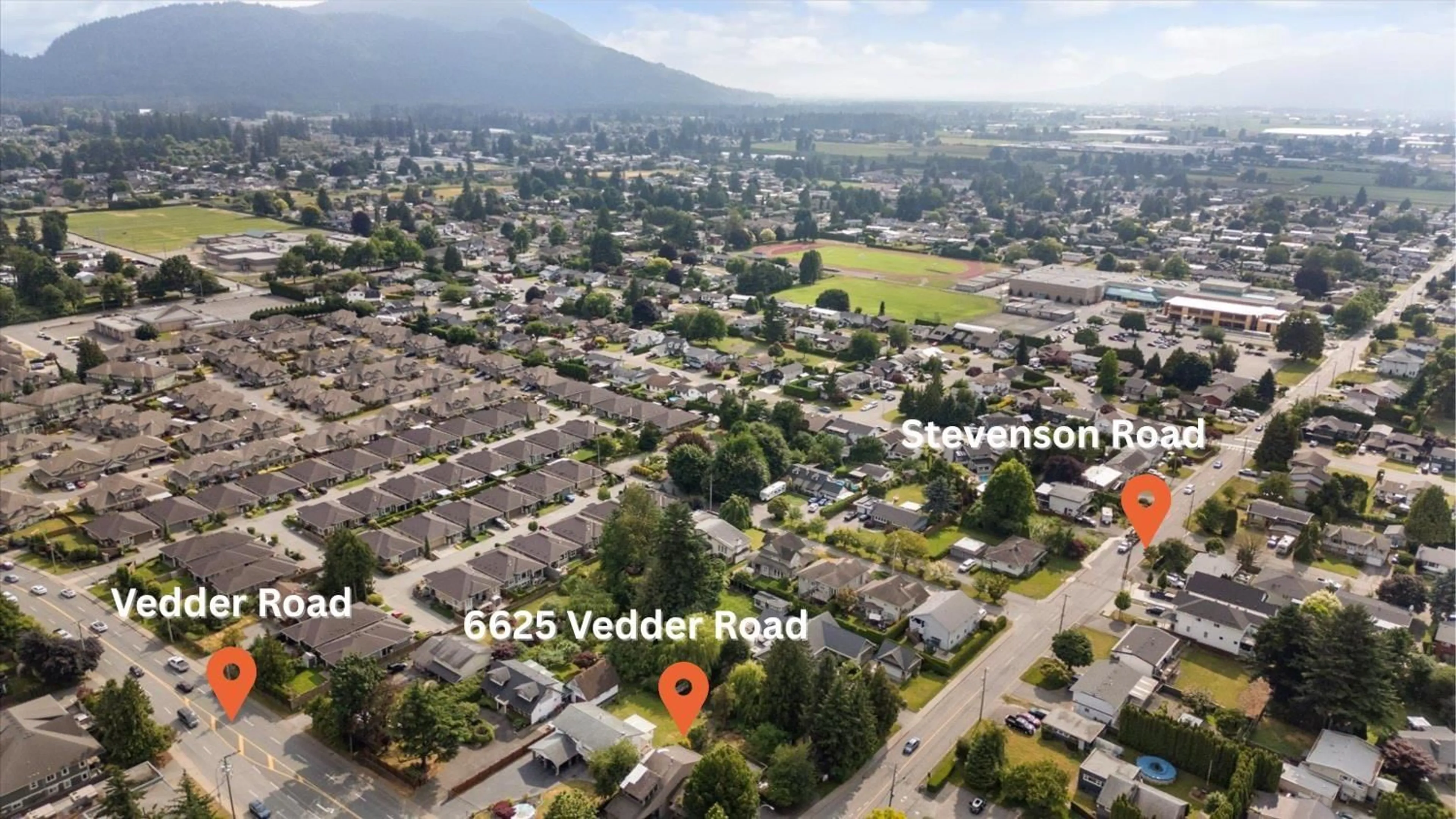 A pic from outside/outdoor area/front of a property/back of a property/a pic from drone, mountain view for 6625 VEDDER ROAD, Chilliwack British Columbia V2R1C9