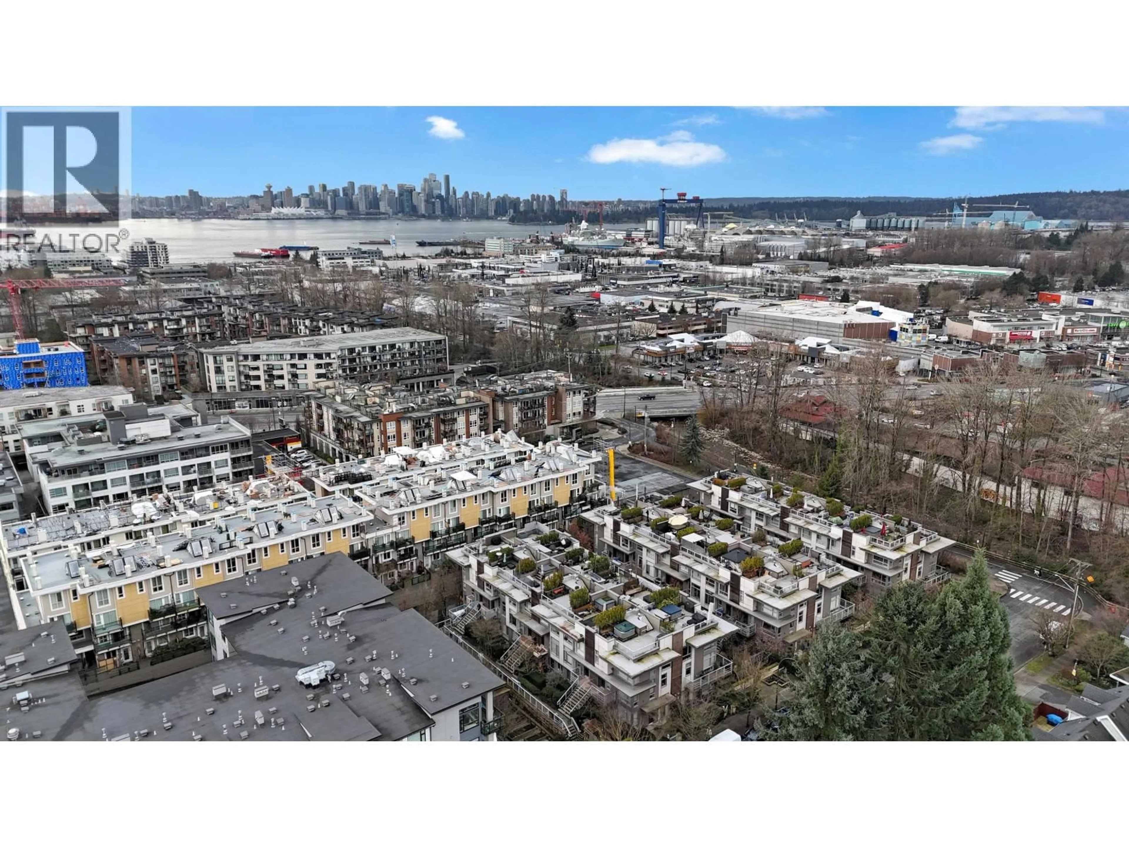 A pic from outside/outdoor area/front of a property/back of a property/a pic from drone, city buildings view from balcony for 103 - 735 15TH STREET, North Vancouver British Columbia V7M0B8
