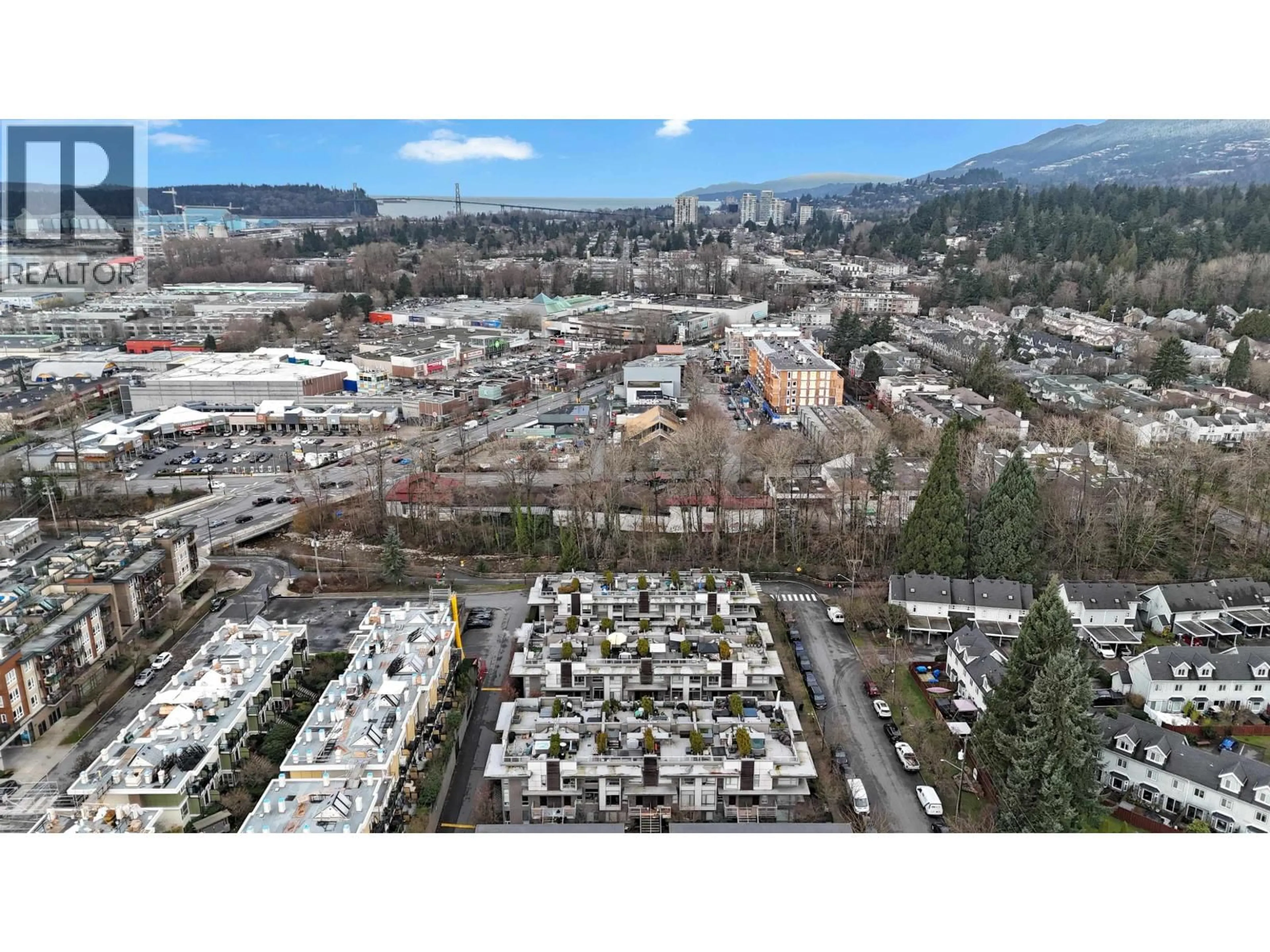 A pic from outside/outdoor area/front of a property/back of a property/a pic from drone, mountain view for 103 - 735 15TH STREET, North Vancouver British Columbia V7M0B8