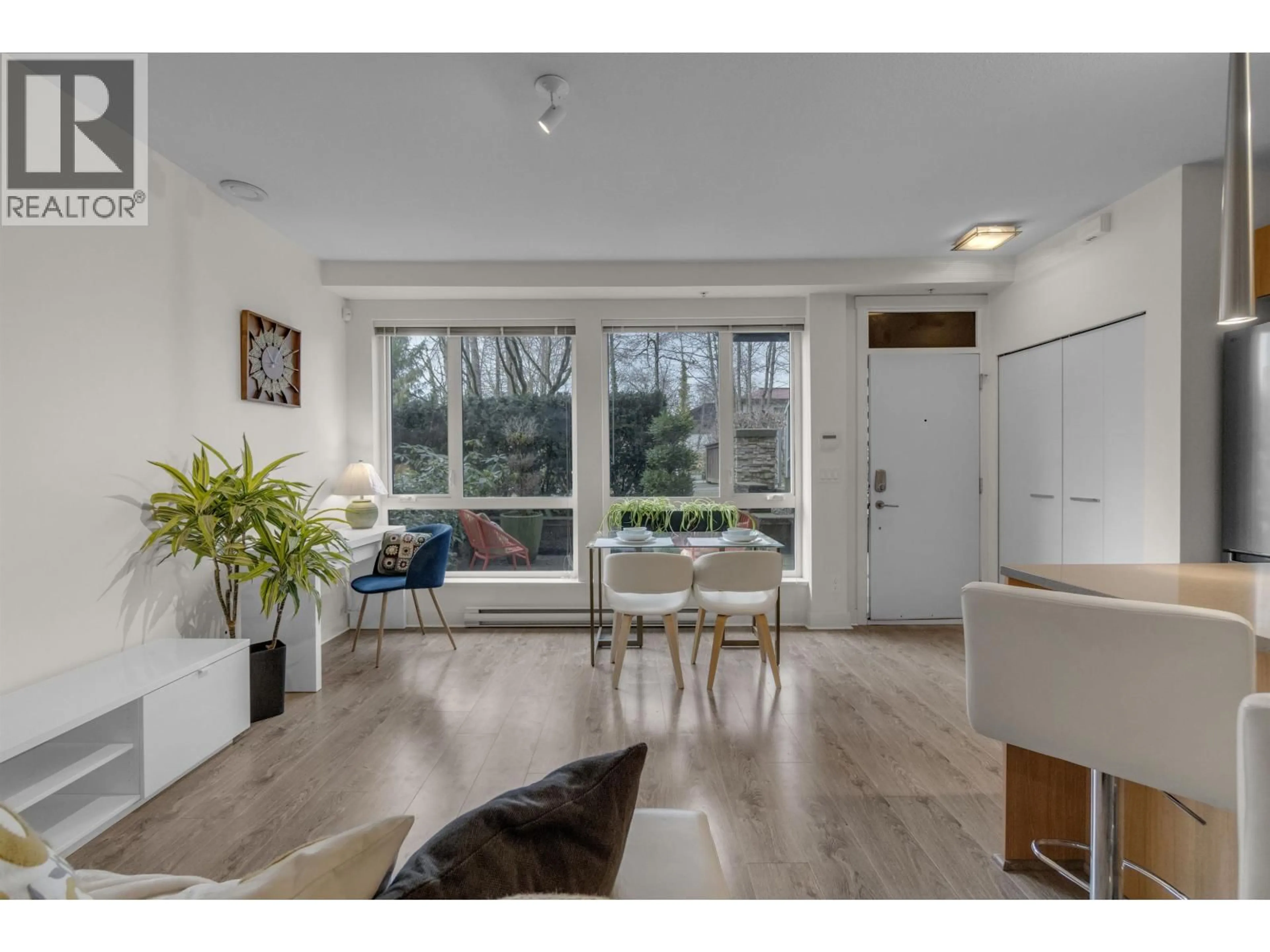 Living room with furniture, unknown for 103 - 735 15TH STREET, North Vancouver British Columbia V7M0B8