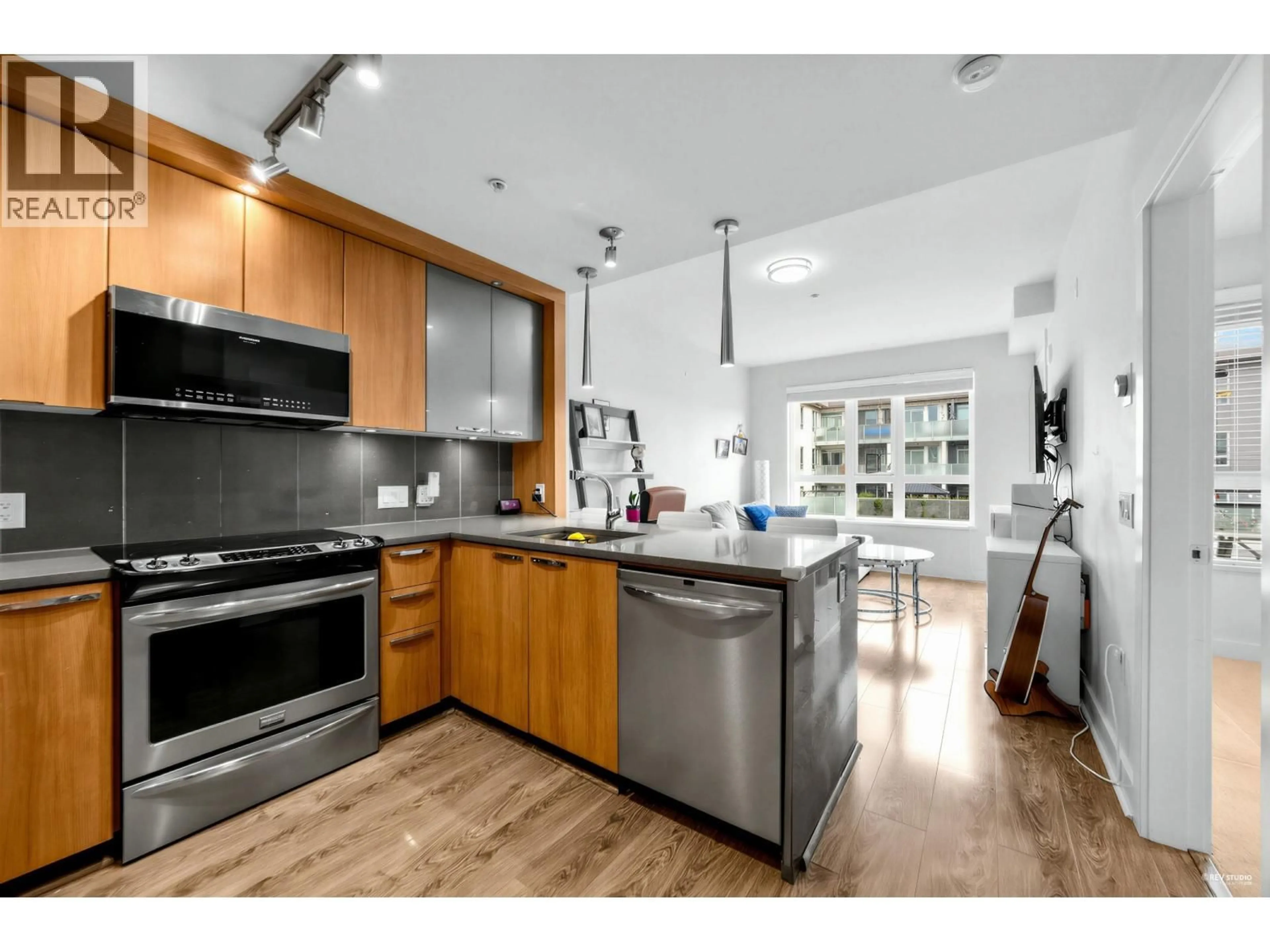 Open concept kitchen, unknown for 307 - 733 14TH STREET, North Vancouver British Columbia V7M0C6