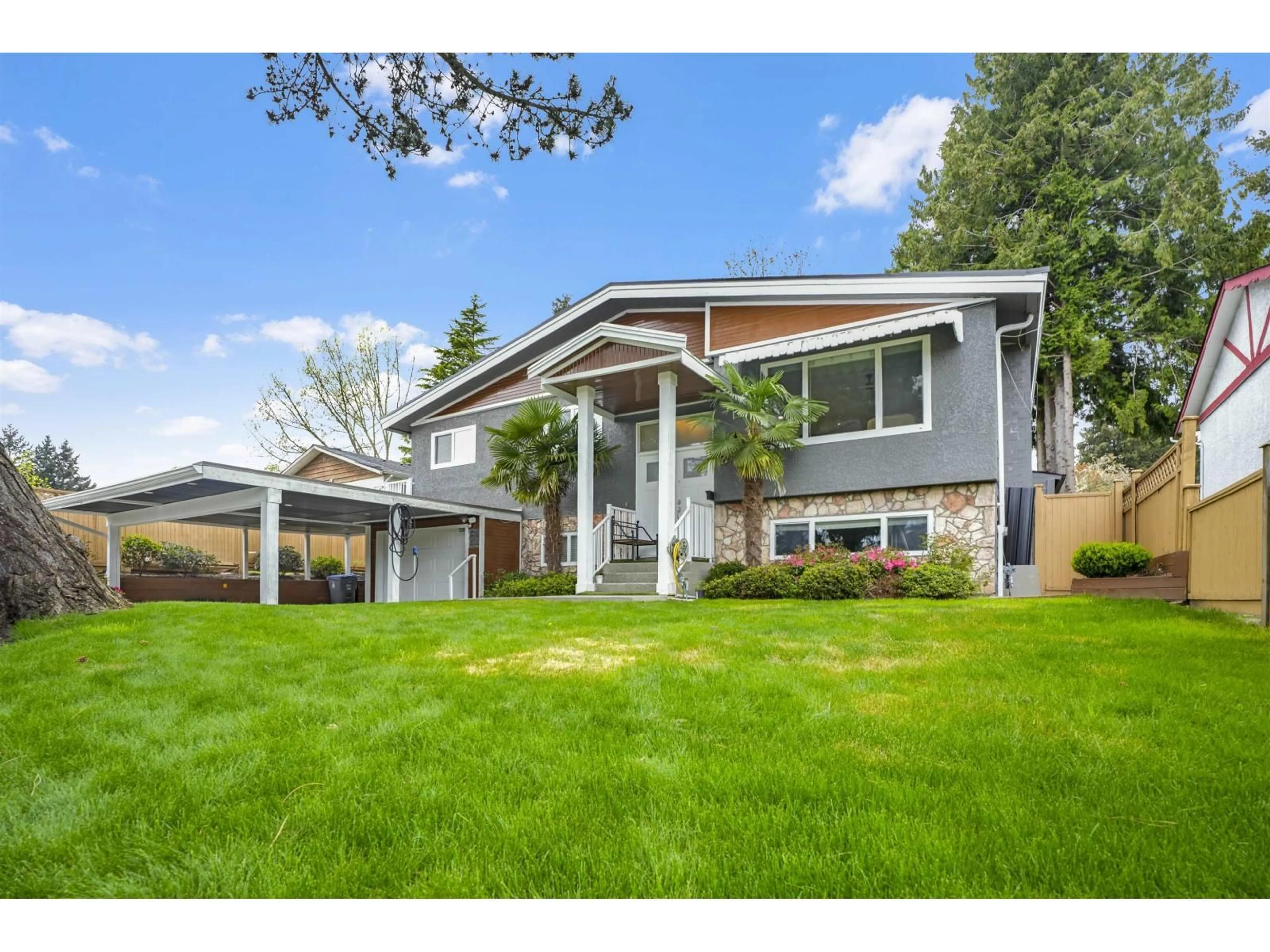 Home with vinyl exterior material, street for 9027 PRINCE CHARLES BOULEVARD, Surrey British Columbia V3V1R7