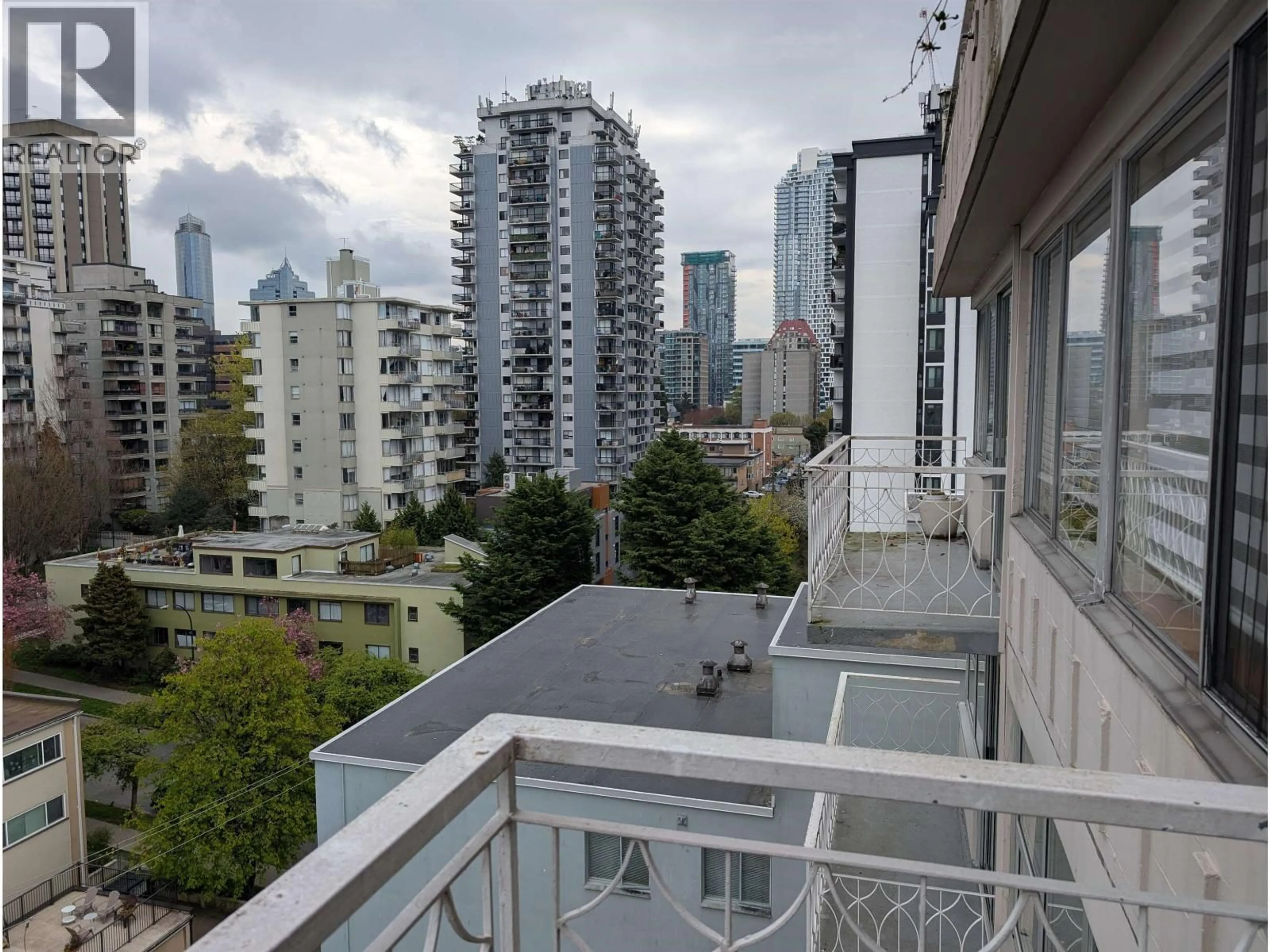 Balcony in the apartment, city buildings view from balcony for 1104 - 1219 HARWOOD STREET, Vancouver British Columbia V6E1S5