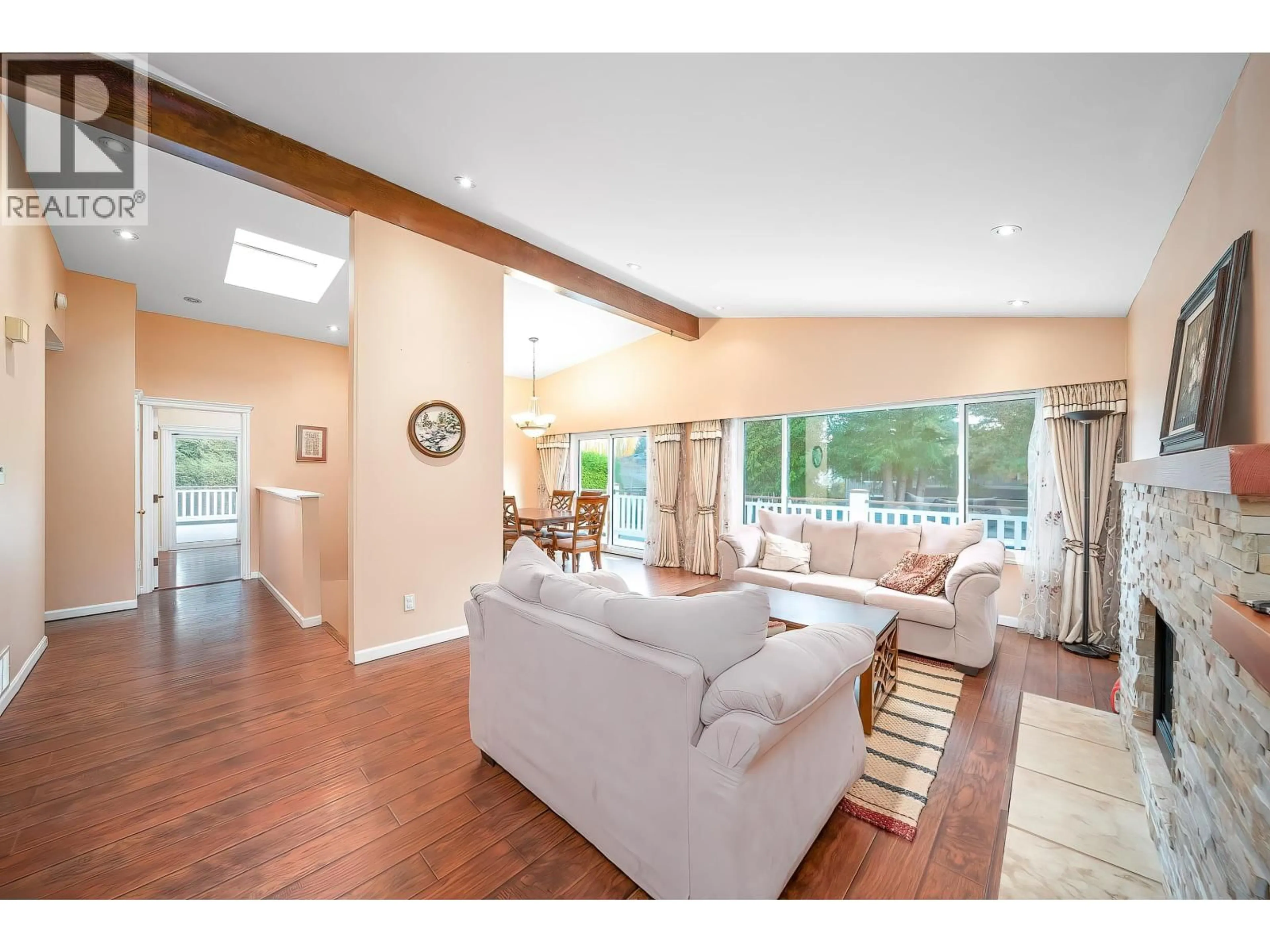 Living room with furniture, wood/laminate floor for 10751 MERSEY DRIVE, Richmond British Columbia V7A3N5