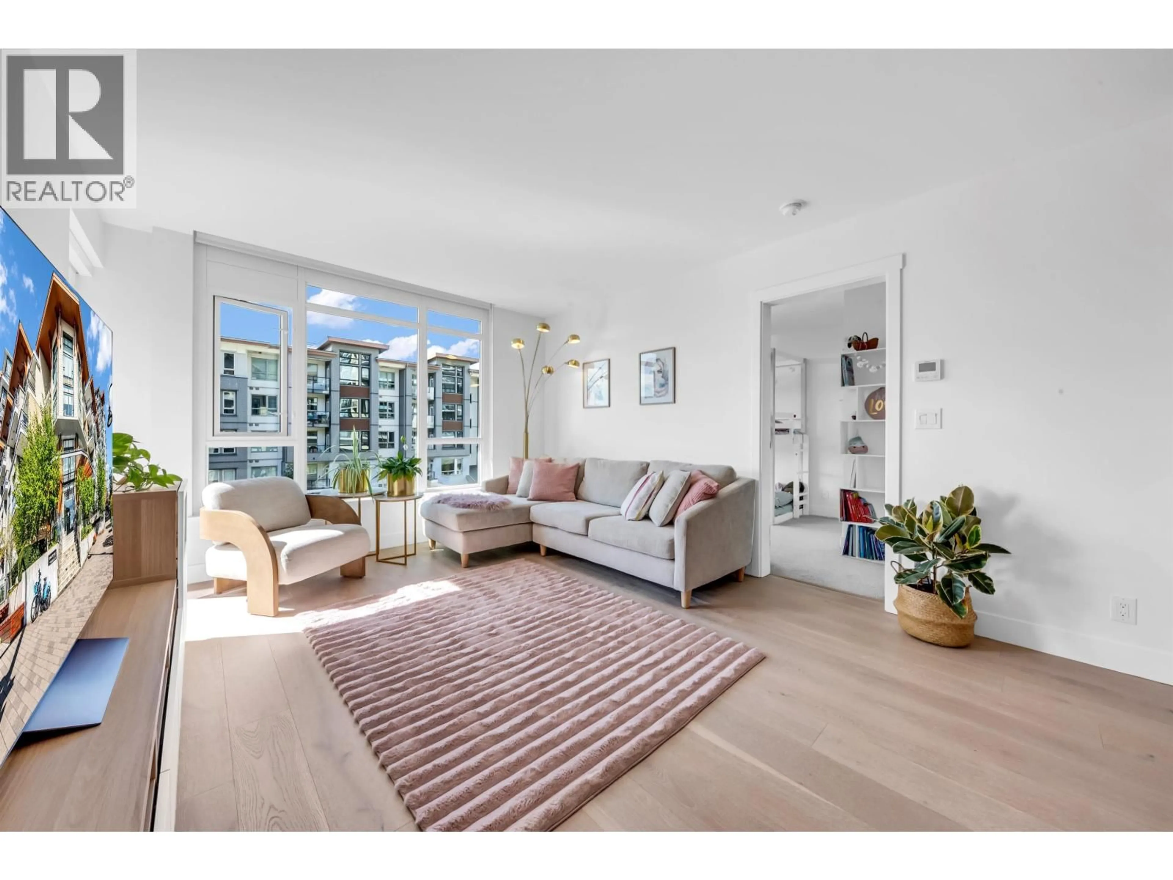 Living room with furniture, unknown for 305 - 2707 LIBRARY LANE, North Vancouver British Columbia V7J0C6