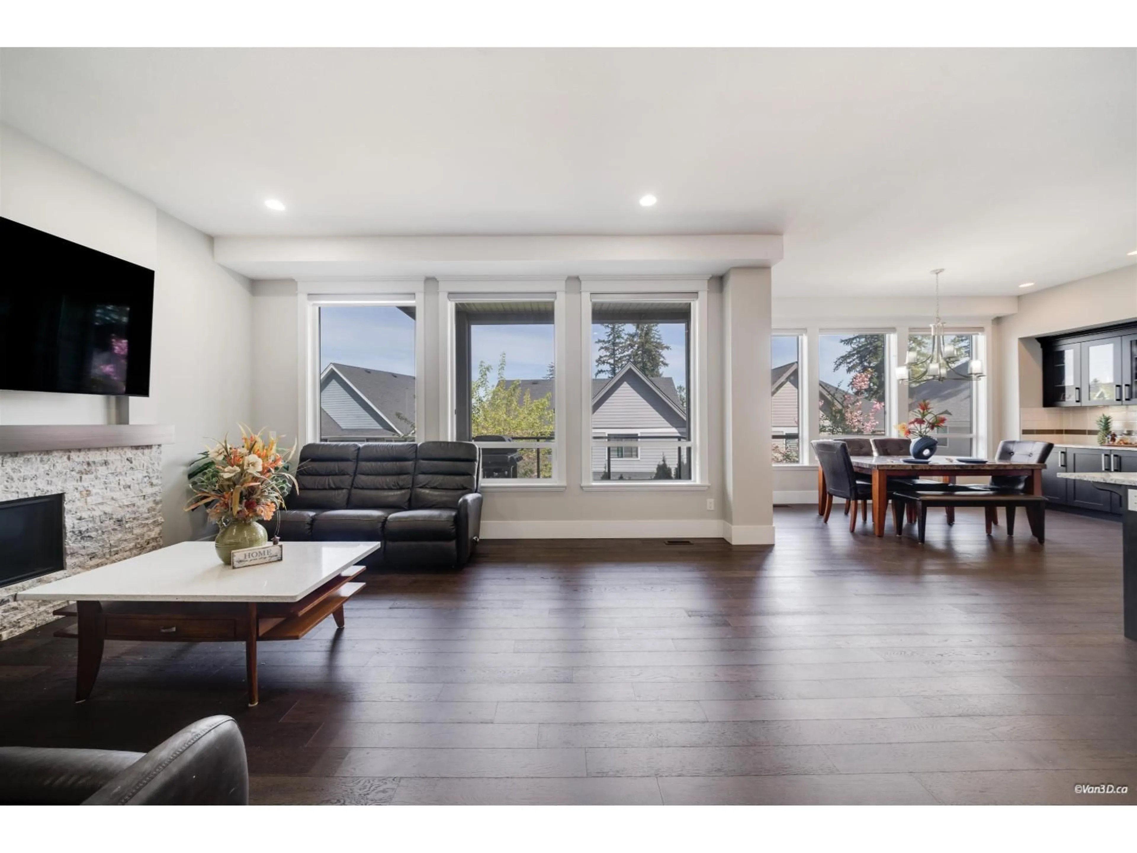 Living room with furniture, wood/laminate floor for 2862 HELC PLACE, Surrey British Columbia V3Z0C6