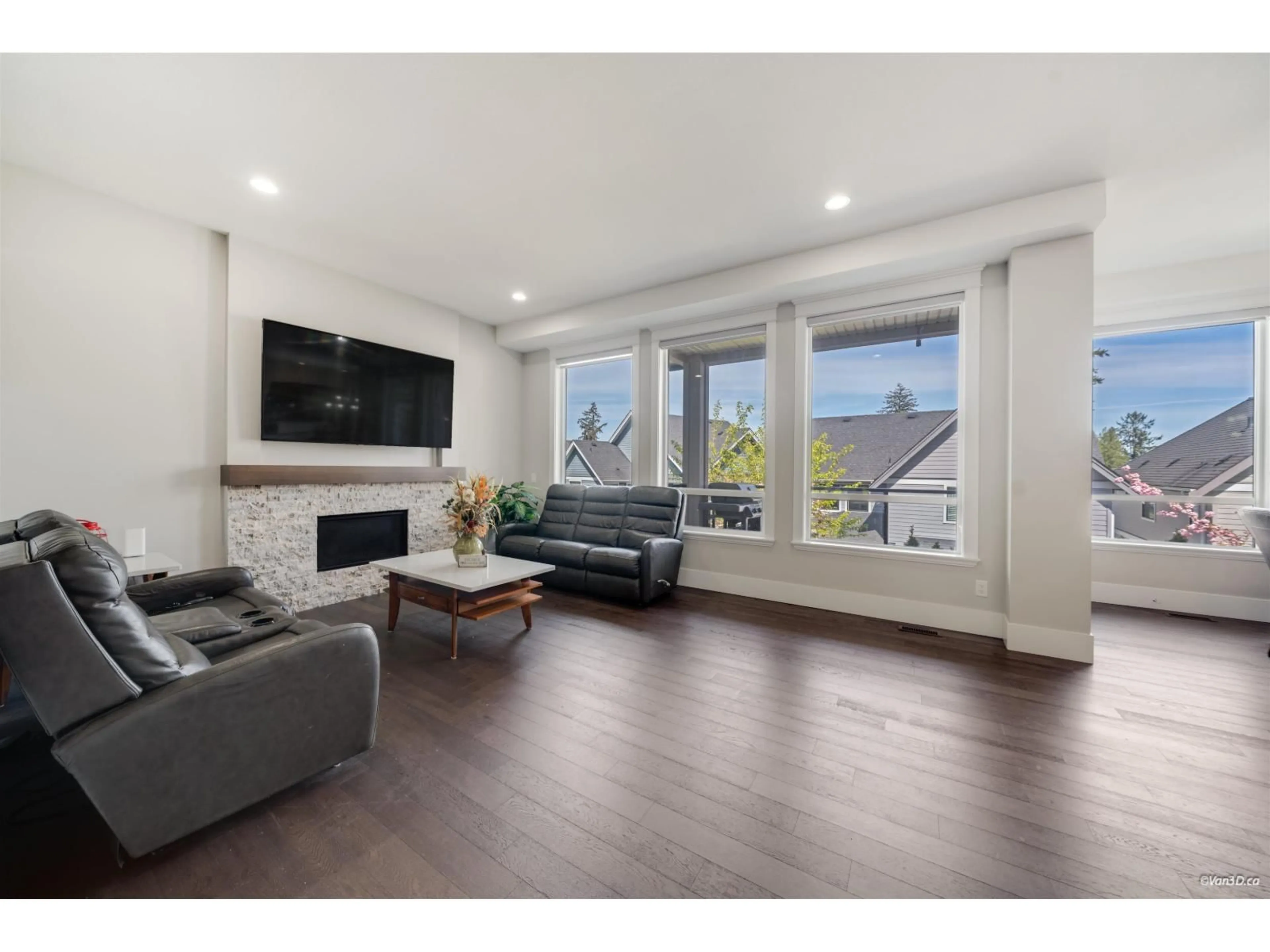 Living room with furniture, wood/laminate floor for 2862 HELC PLACE, Surrey British Columbia V3Z0C6