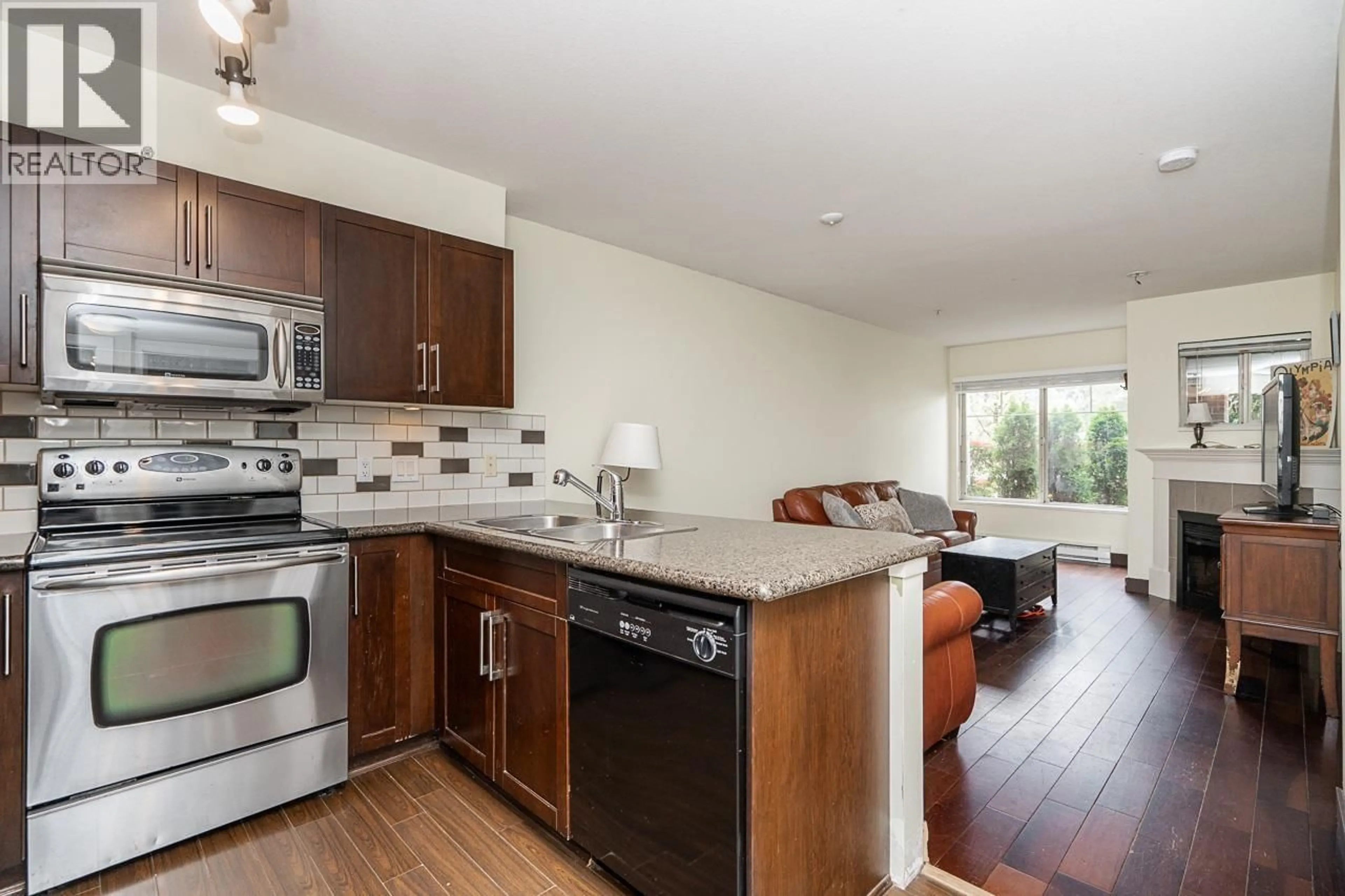 Open concept kitchen, wood/laminate floor for 114 - 2468 ATKINS AVENUE, Port Coquitlam British Columbia V3C1Y9