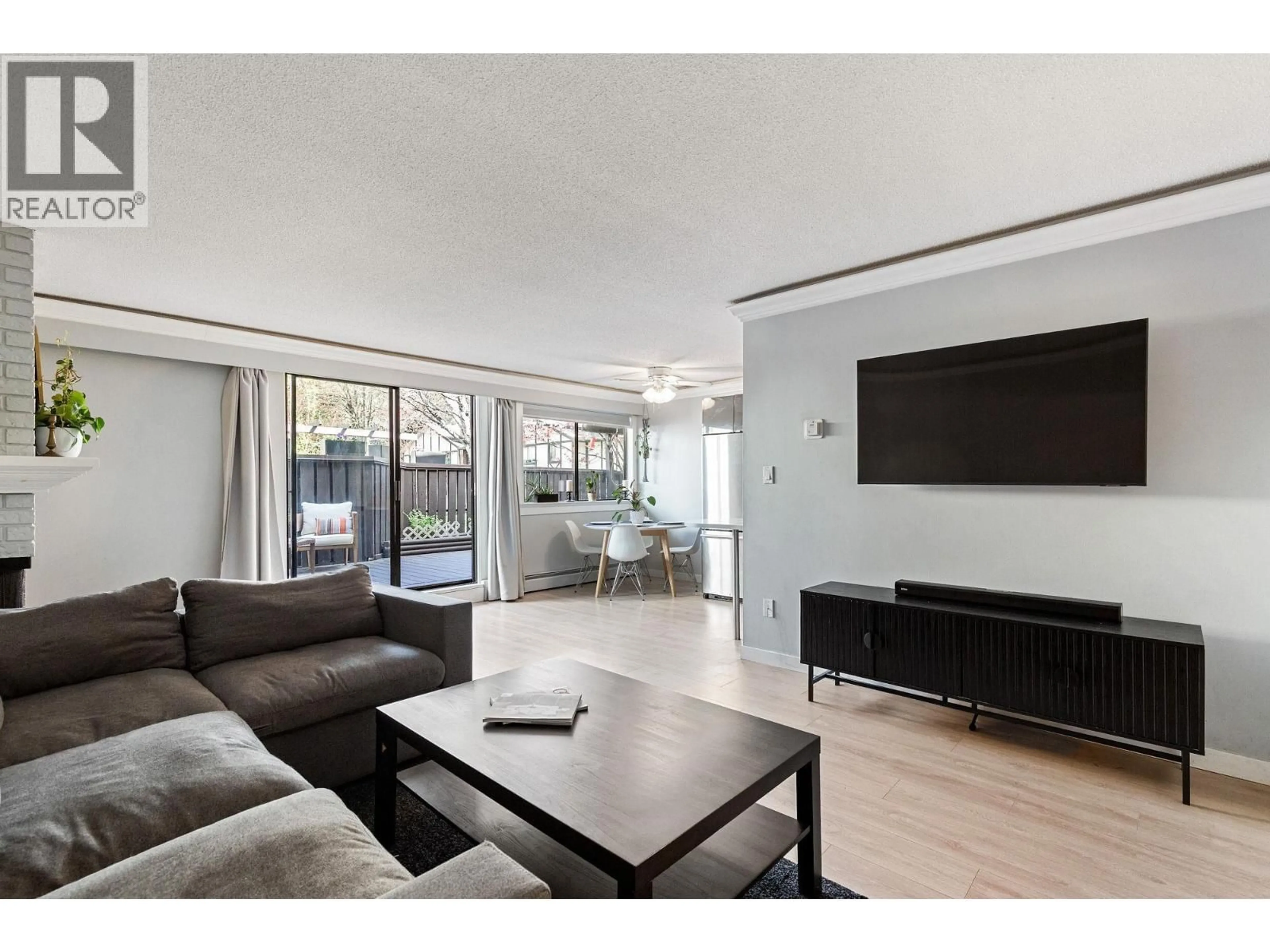 Living room with furniture, wood/laminate floor for 8965 HORNE STREET, Burnaby British Columbia V3N4J8