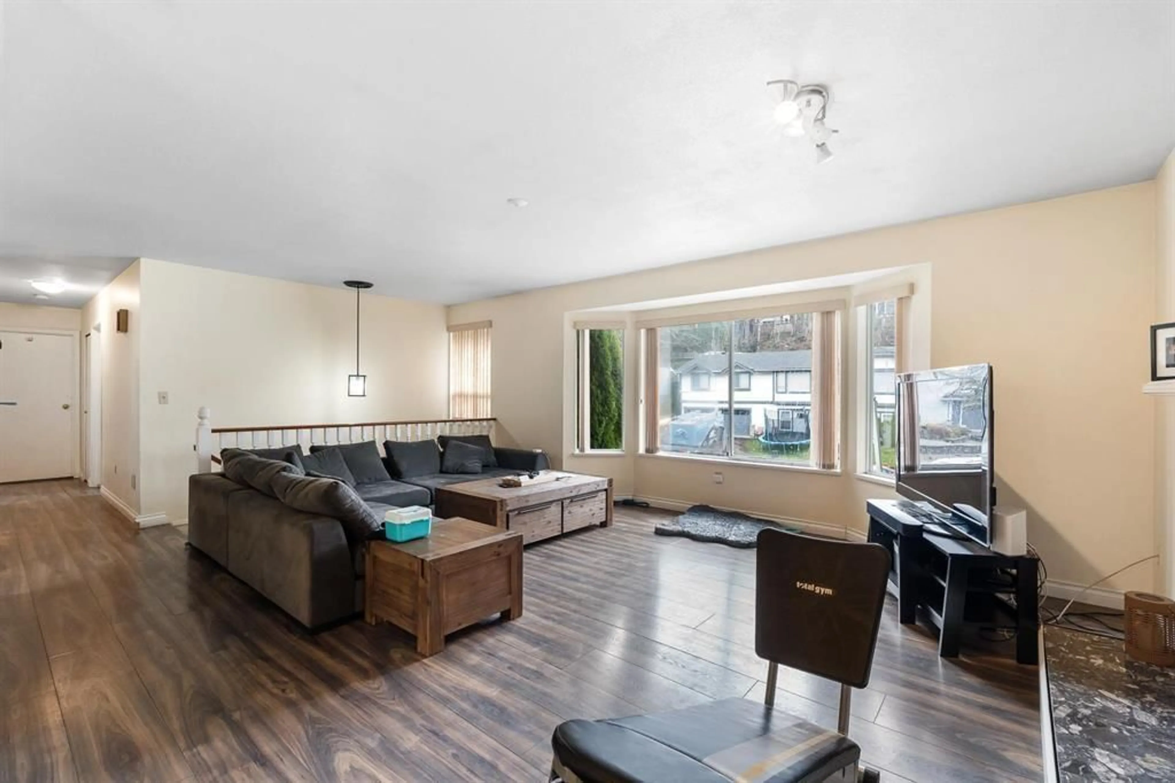 Living room with furniture, wood/laminate floor for 2300 HARPER DRIVE, Abbotsford British Columbia V3G2B2