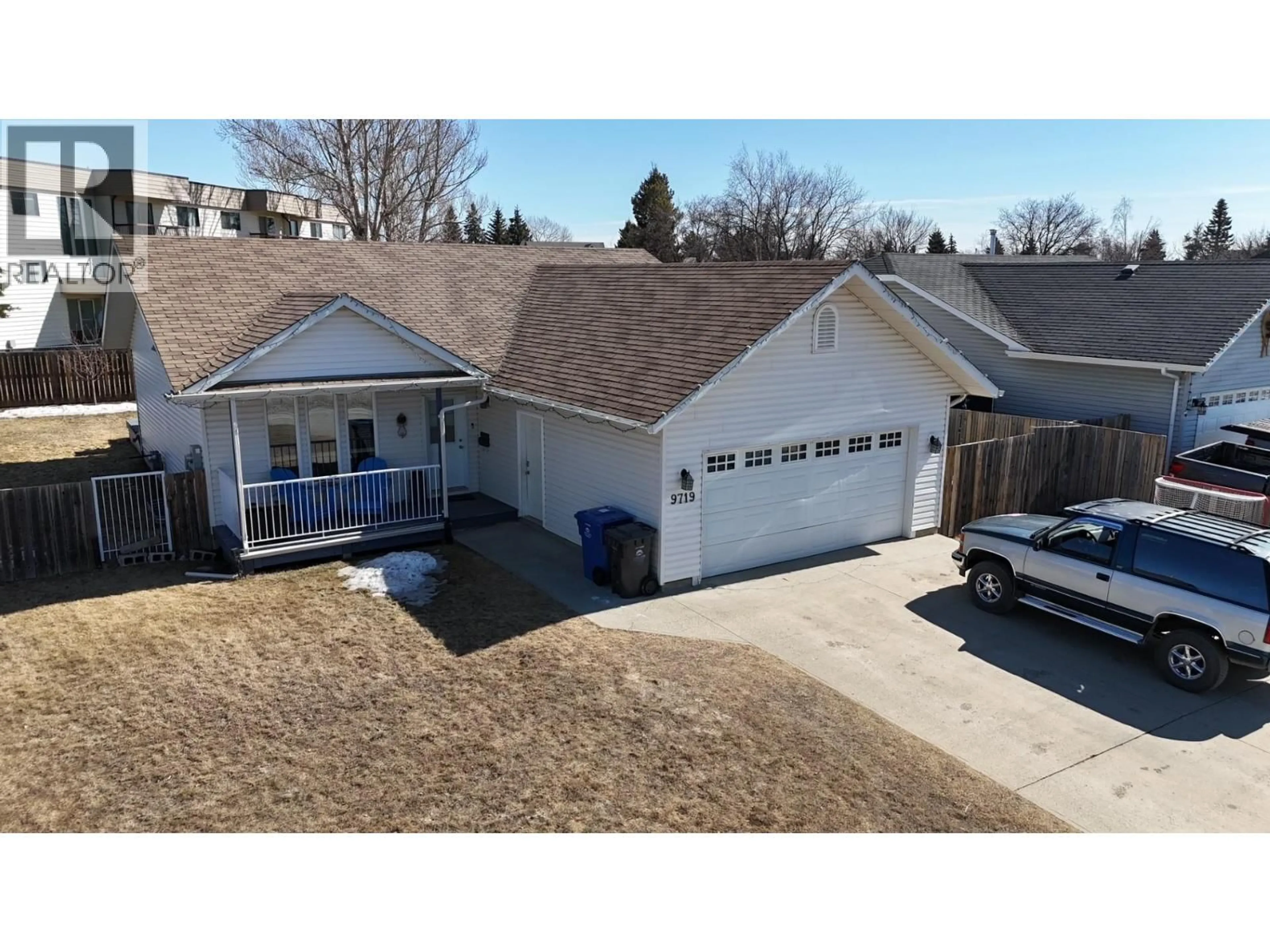 A pic from outside/outdoor area/front of a property/back of a property/a pic from drone, street for 9719 88 STREET, Fort St. John British Columbia V1J0C1