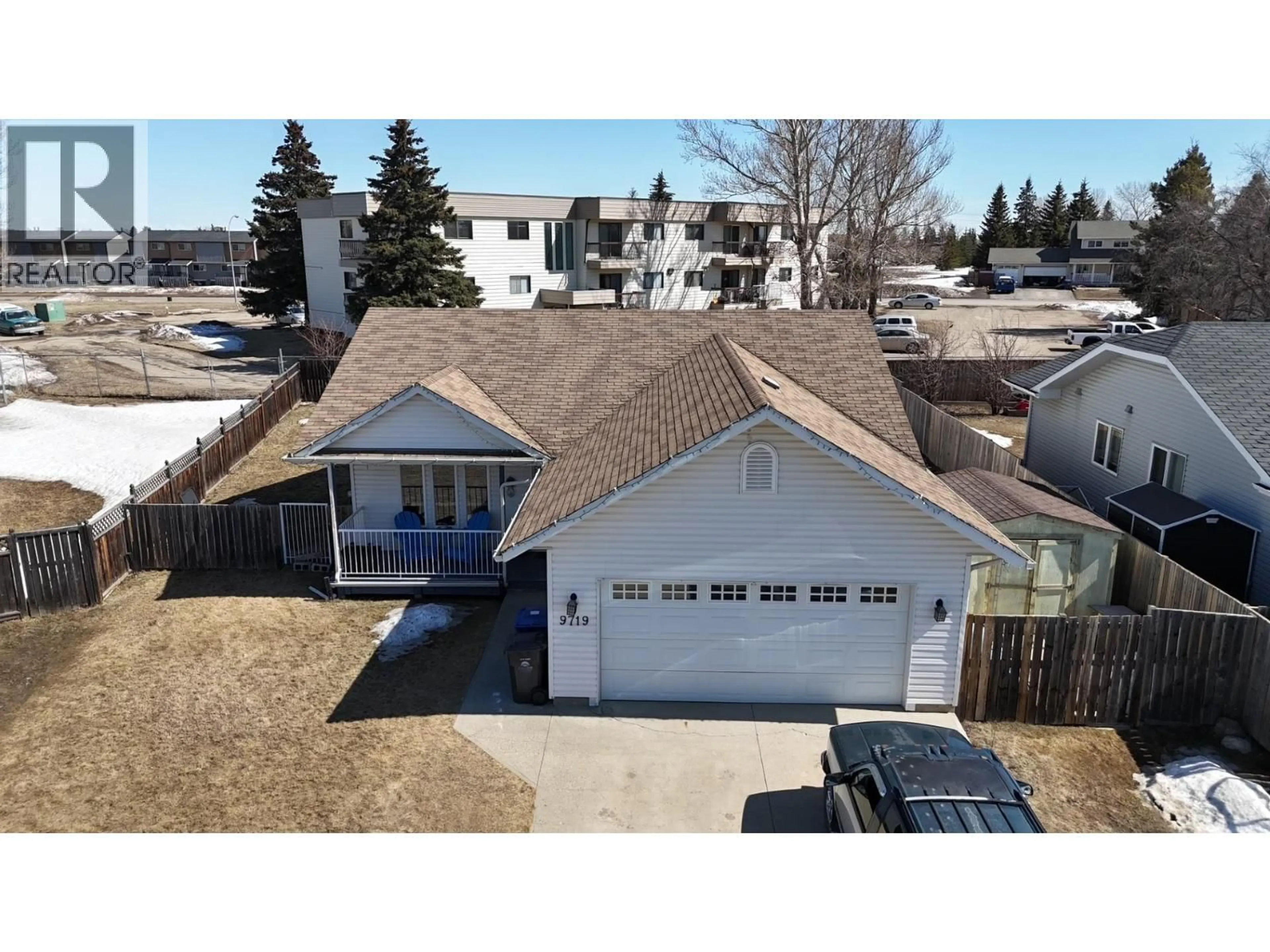 A pic from outside/outdoor area/front of a property/back of a property/a pic from drone, street for 9719 88 STREET, Fort St. John British Columbia V1J0C1