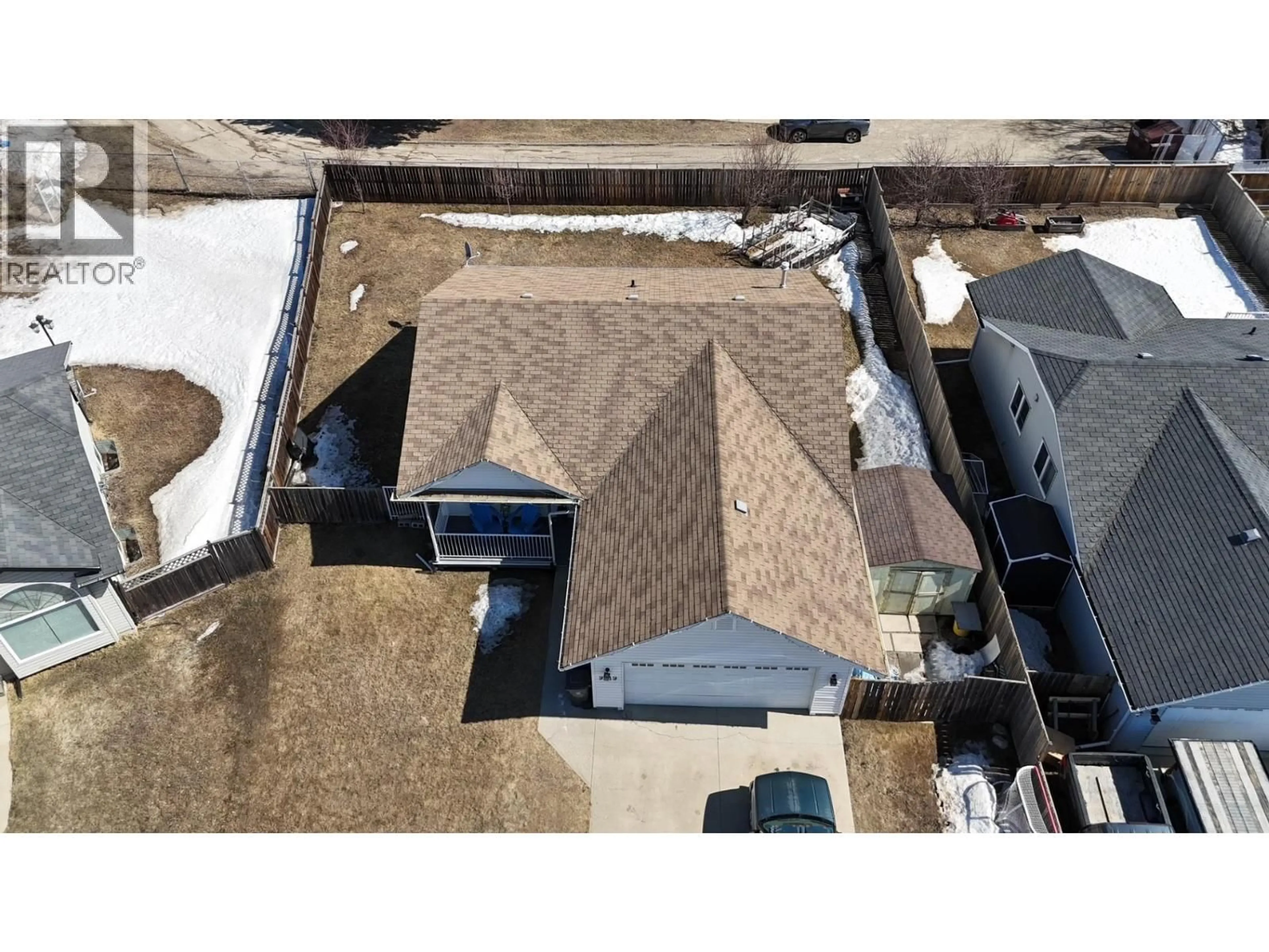 A pic from outside/outdoor area/front of a property/back of a property/a pic from drone, building for 9719 88 STREET, Fort St. John British Columbia V1J0C1