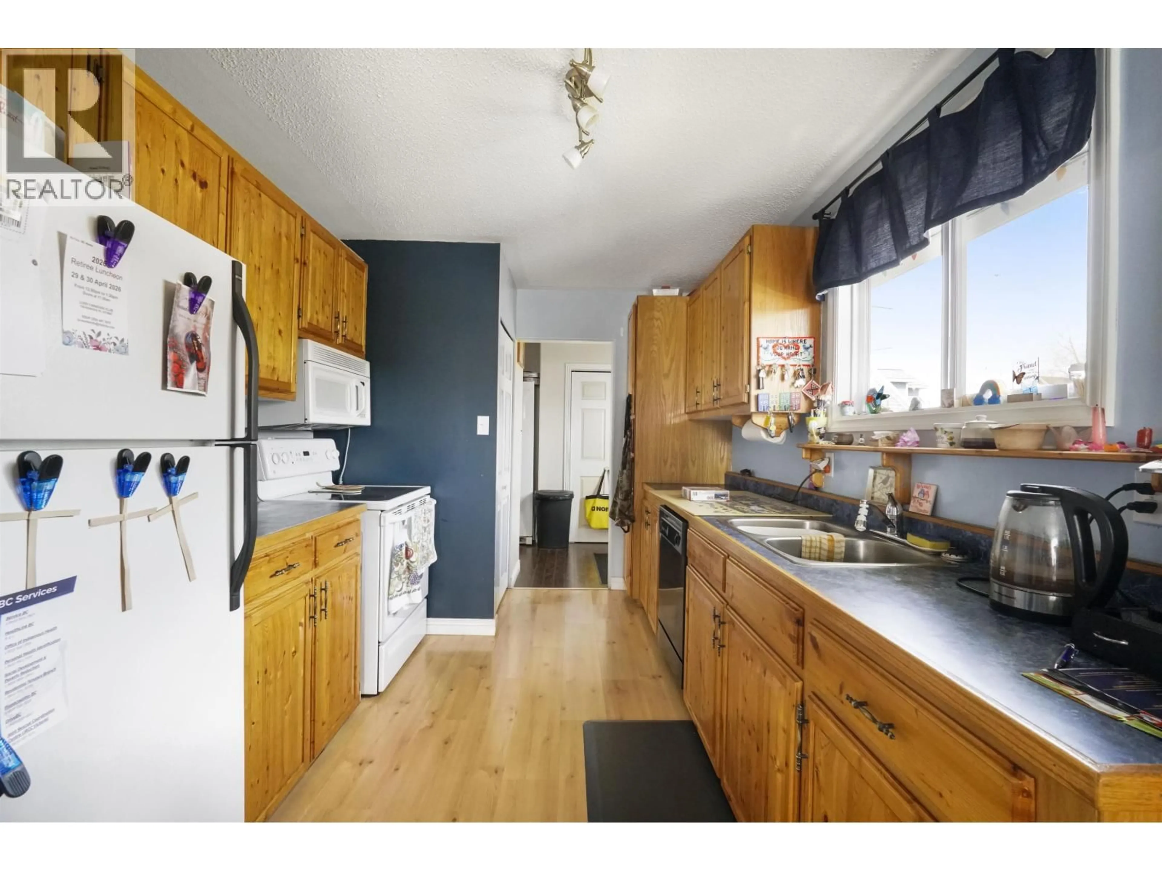 Standard kitchen, wood/laminate floor for 60 SWALLOW STREET, Kitimat British Columbia V8C1K7