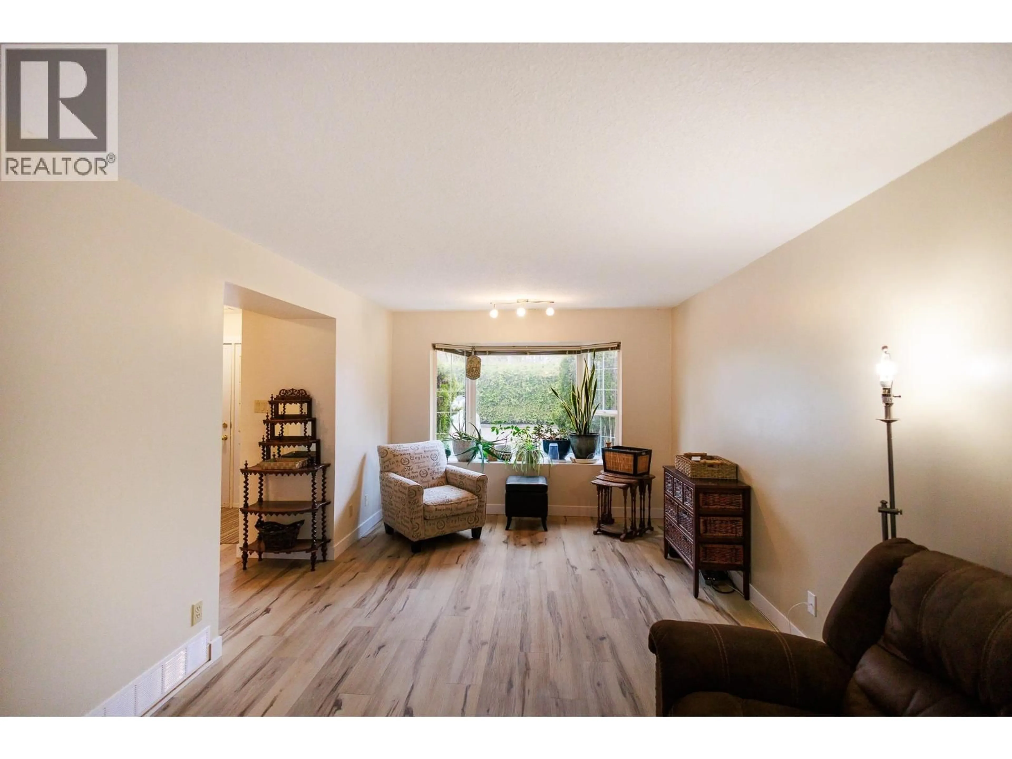 Living room with furniture, wood/laminate floor for 6 - 2609 BRAUN STREET, Terrace British Columbia V8G3J7