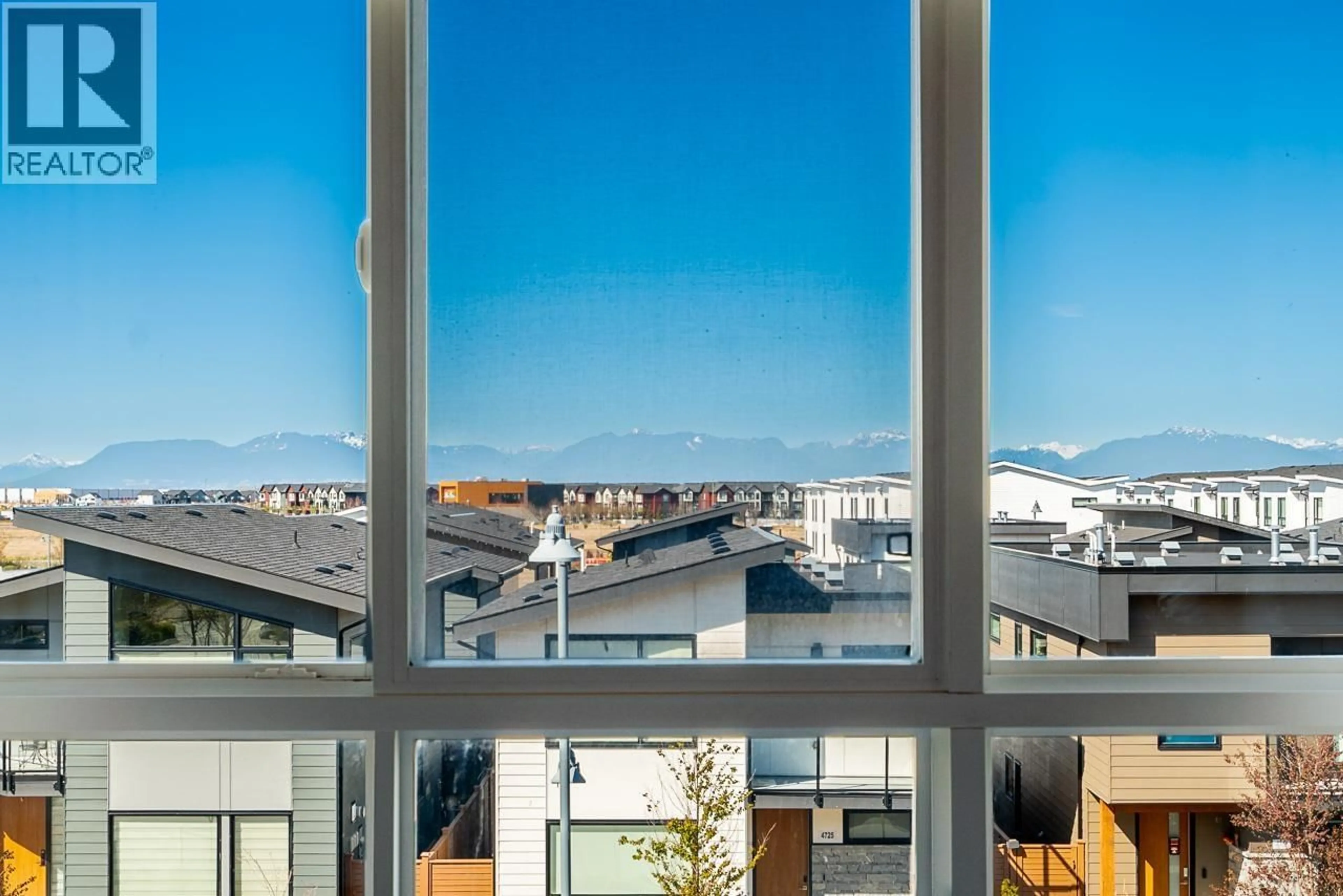 Balcony in the apartment, city buildings view from balcony for 103 - 1894 OSPREY DRIVE, Tsawwassen British Columbia V4M0A8