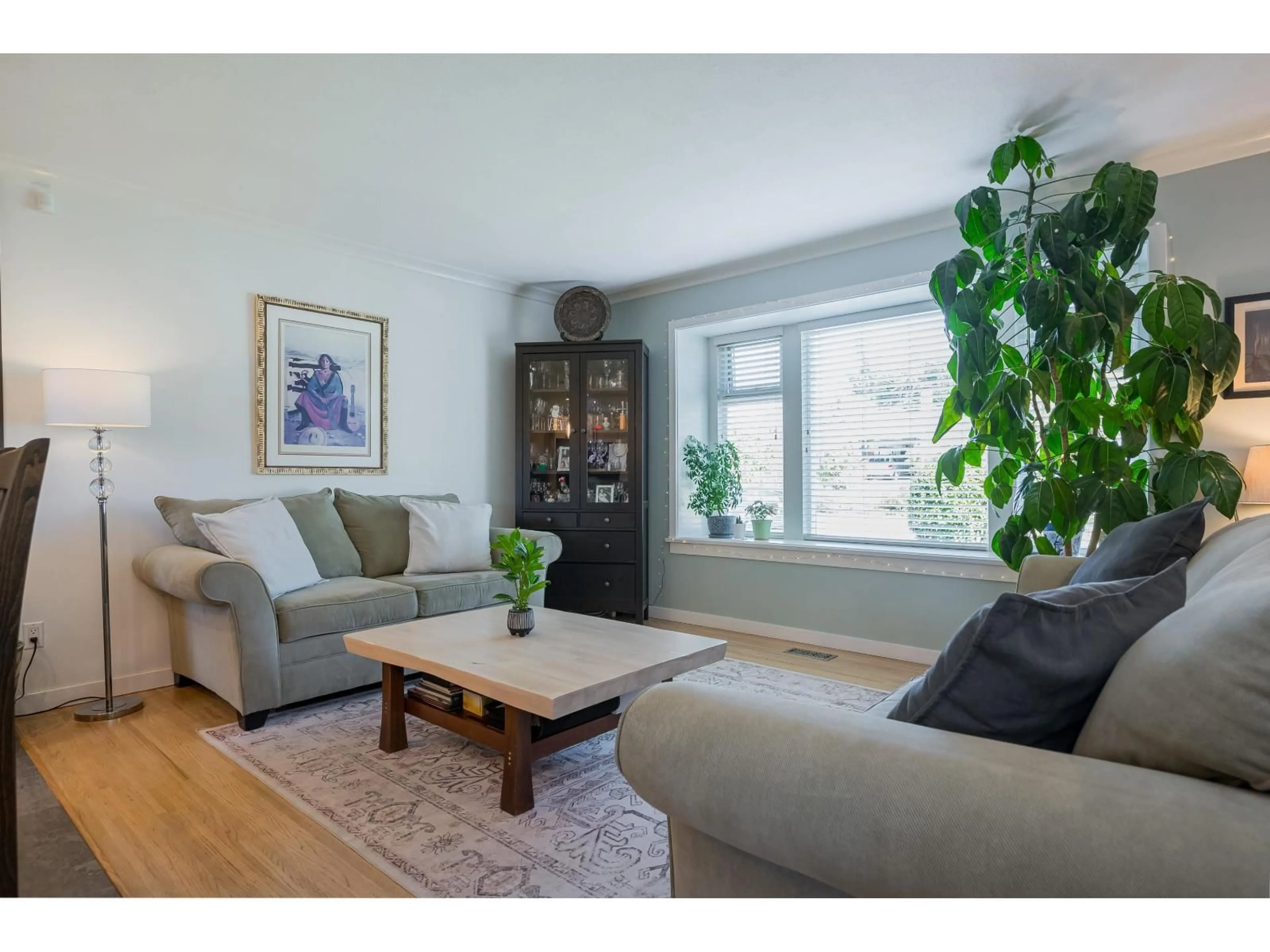 Living room with furniture, wood/laminate floor for 7457 118A STREET, Delta British Columbia V4C6J8