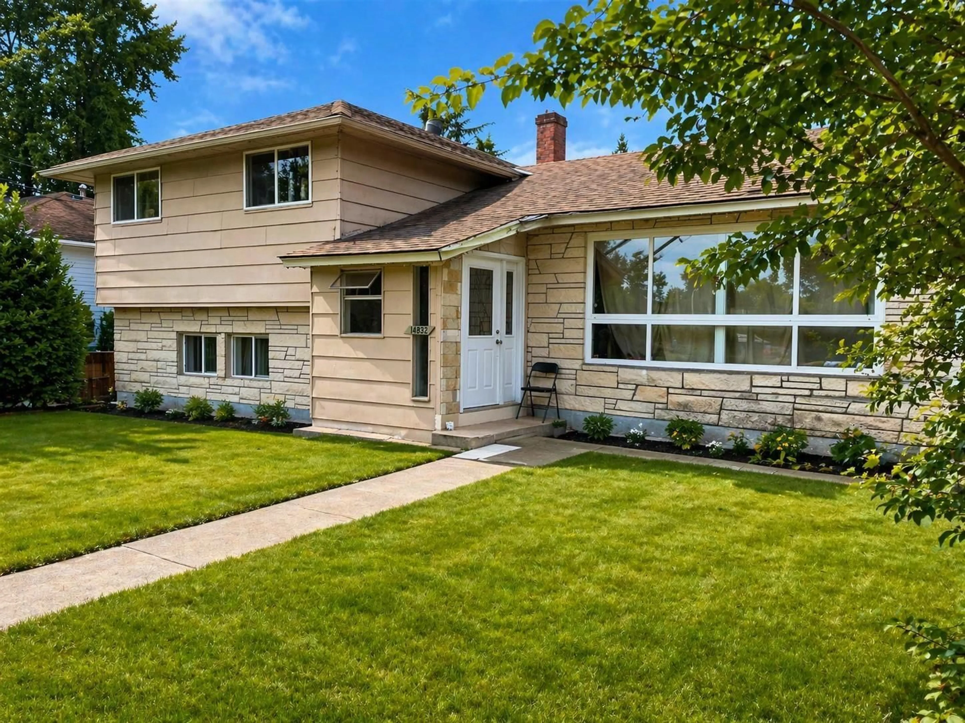 Home with vinyl exterior material, street for 14832 103A AVENUE, Surrey British Columbia V3R1L7