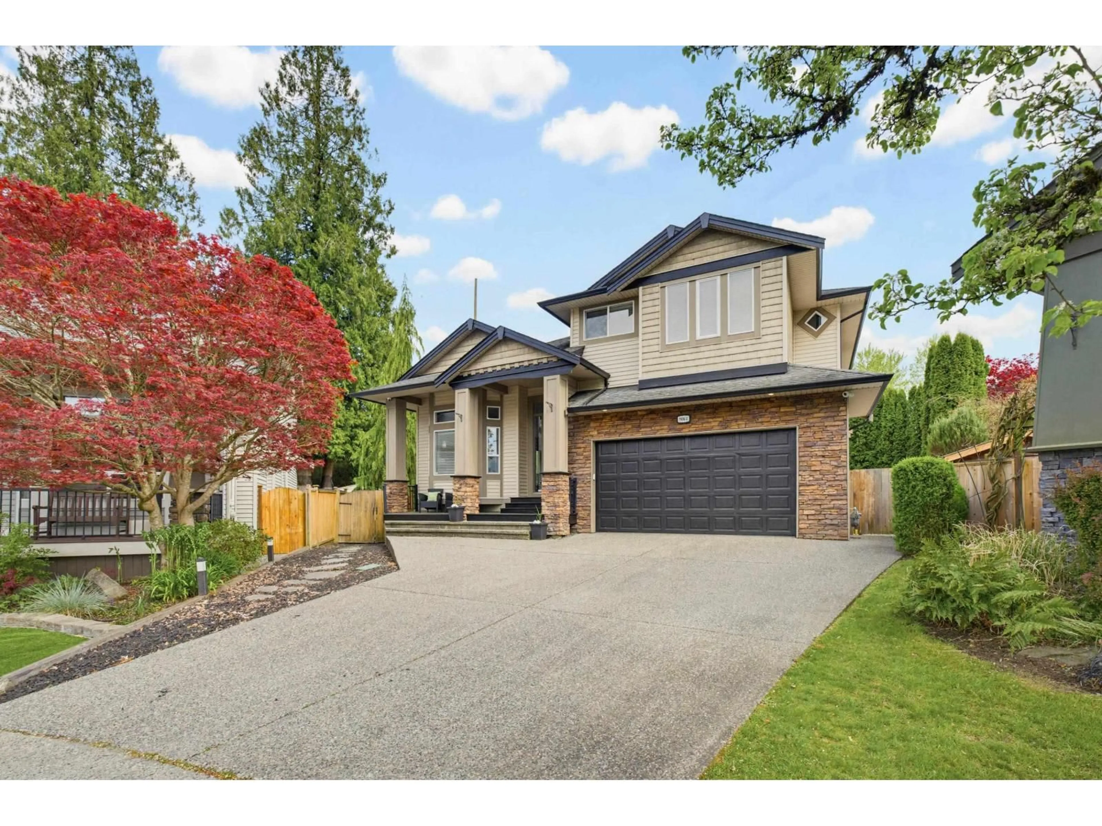 Home with brick exterior material, street for 9064 217 STREET, Langley British Columbia V1M4C9