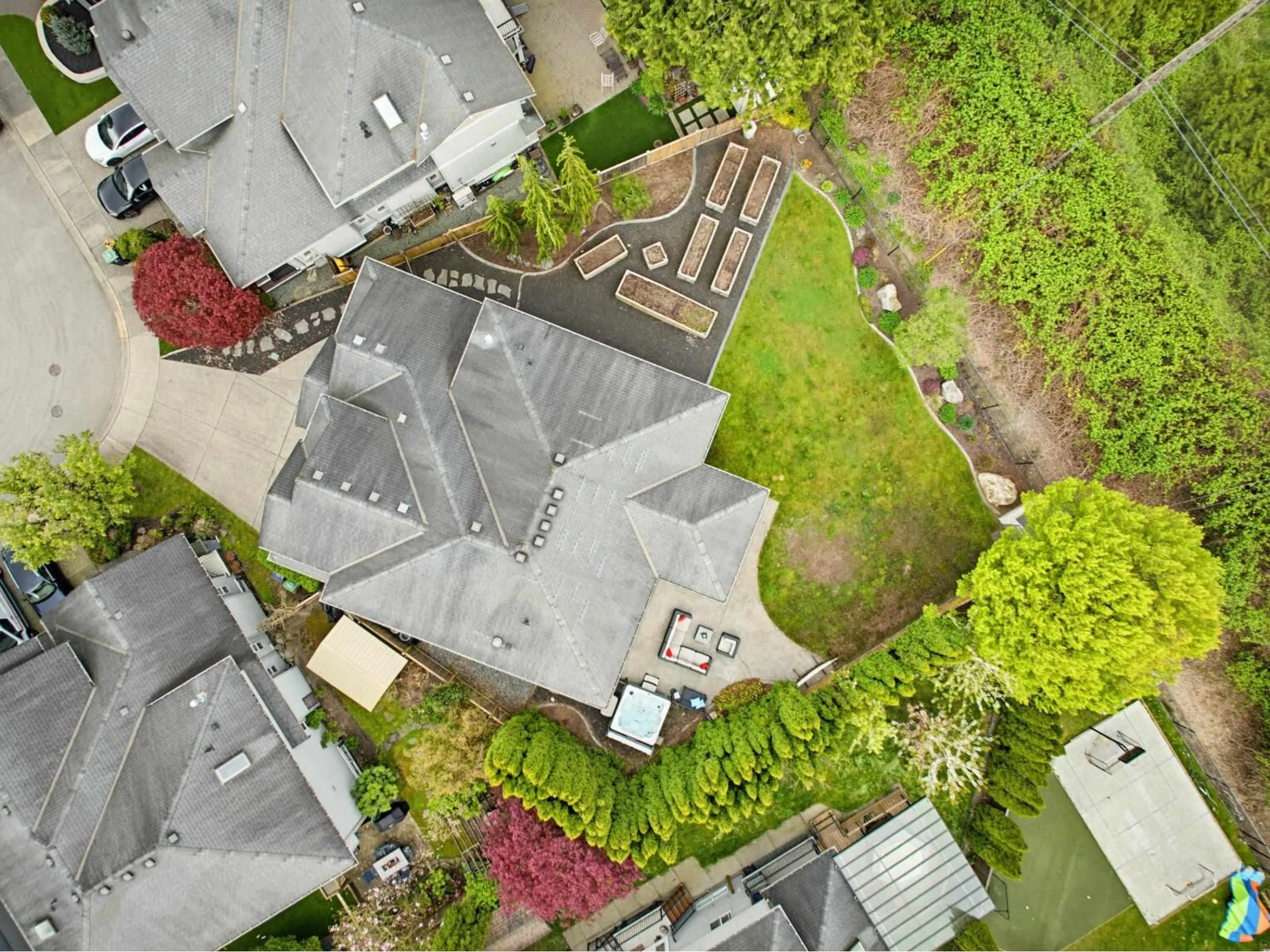 A pic from outside/outdoor area/front of a property/back of a property/a pic from drone, street for 9064 217 STREET, Langley British Columbia V1M4C9