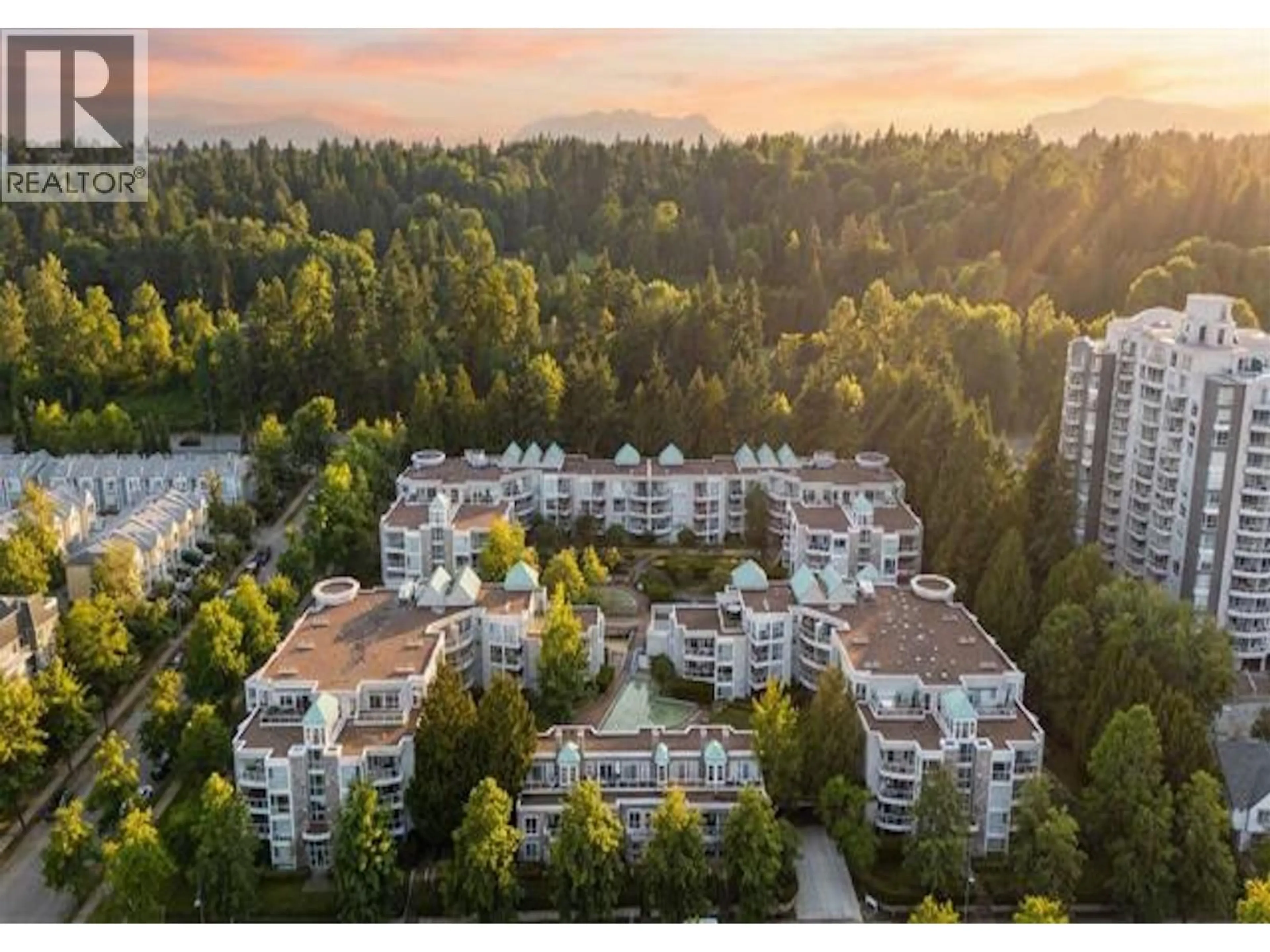 A pic from outside/outdoor area/front of a property/back of a property/a pic from drone, unknown for 101 - 8460 JELLICOE STREET, Vancouver British Columbia V5S4S8