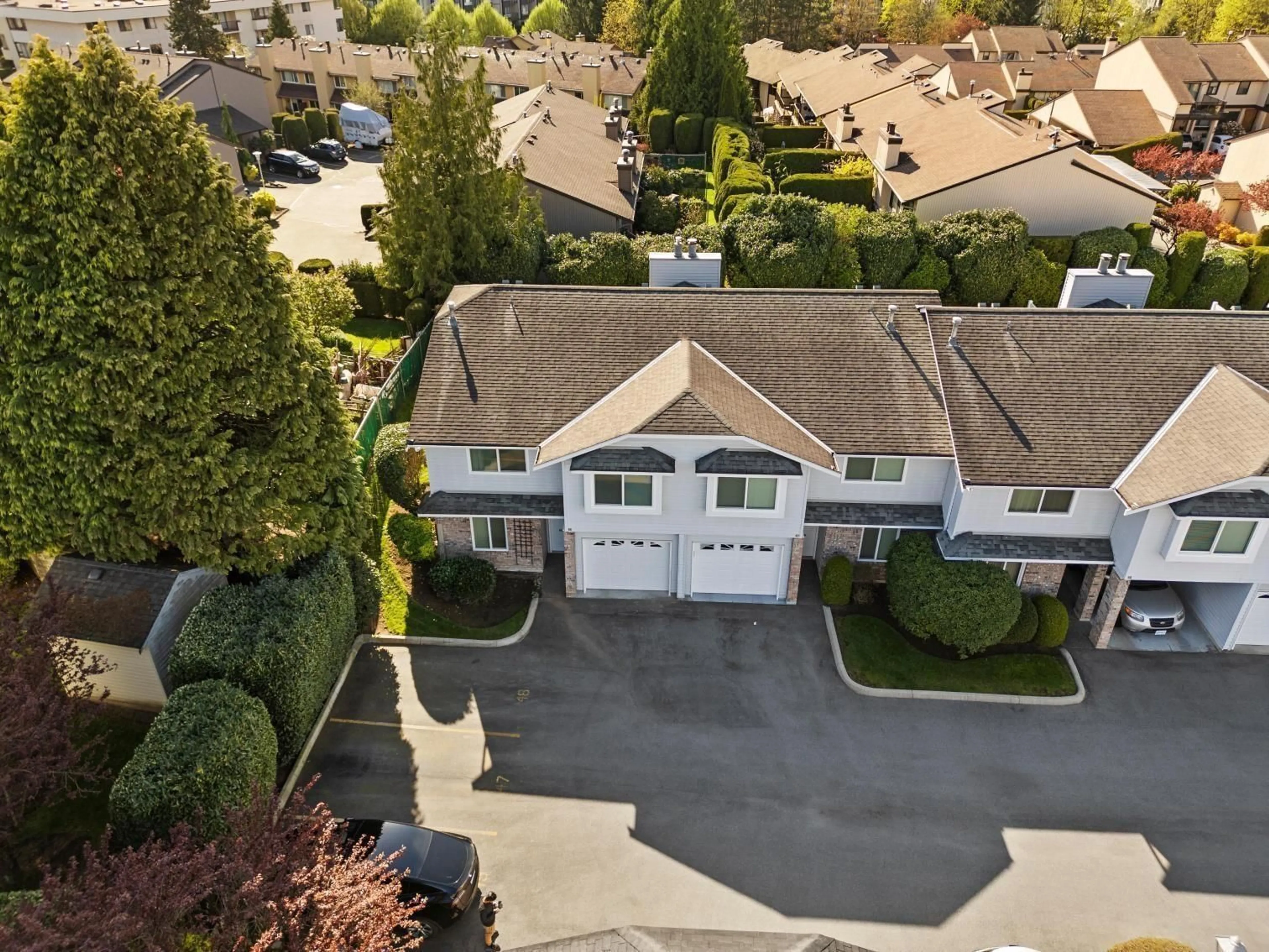 A pic from outside/outdoor area/front of a property/back of a property/a pic from drone, street for 48 - 2989 TRAFALGAR STREET, Abbotsford British Columbia V2S7X9