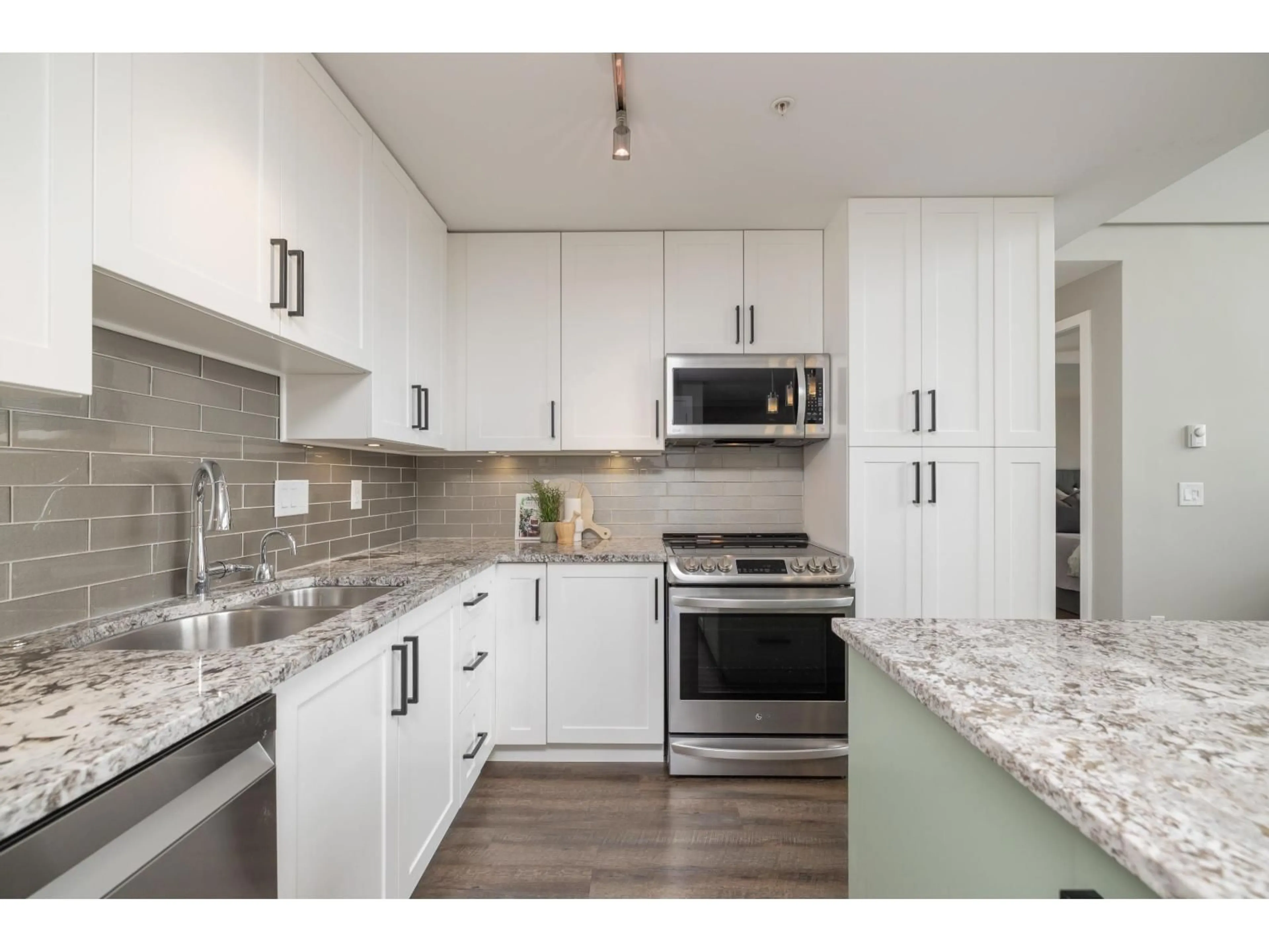 Open concept kitchen, unknown for 415 - 6490 194 STREET, Surrey British Columbia V4N6J9