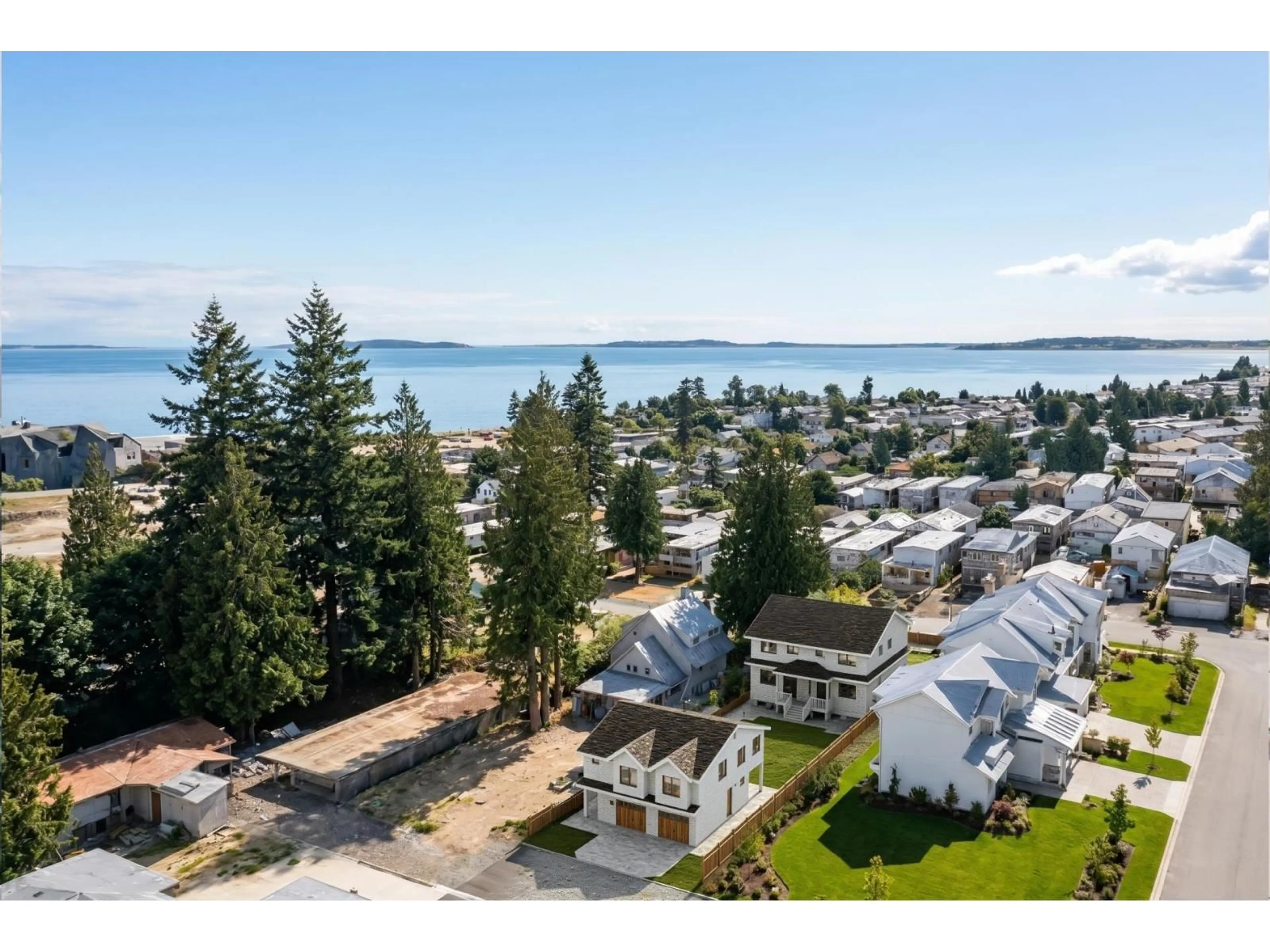 A pic from outside/outdoor area/front of a property/back of a property/a pic from drone, water/lake/river/ocean view for 946 160 STREET, Surrey British Columbia V4A4W5