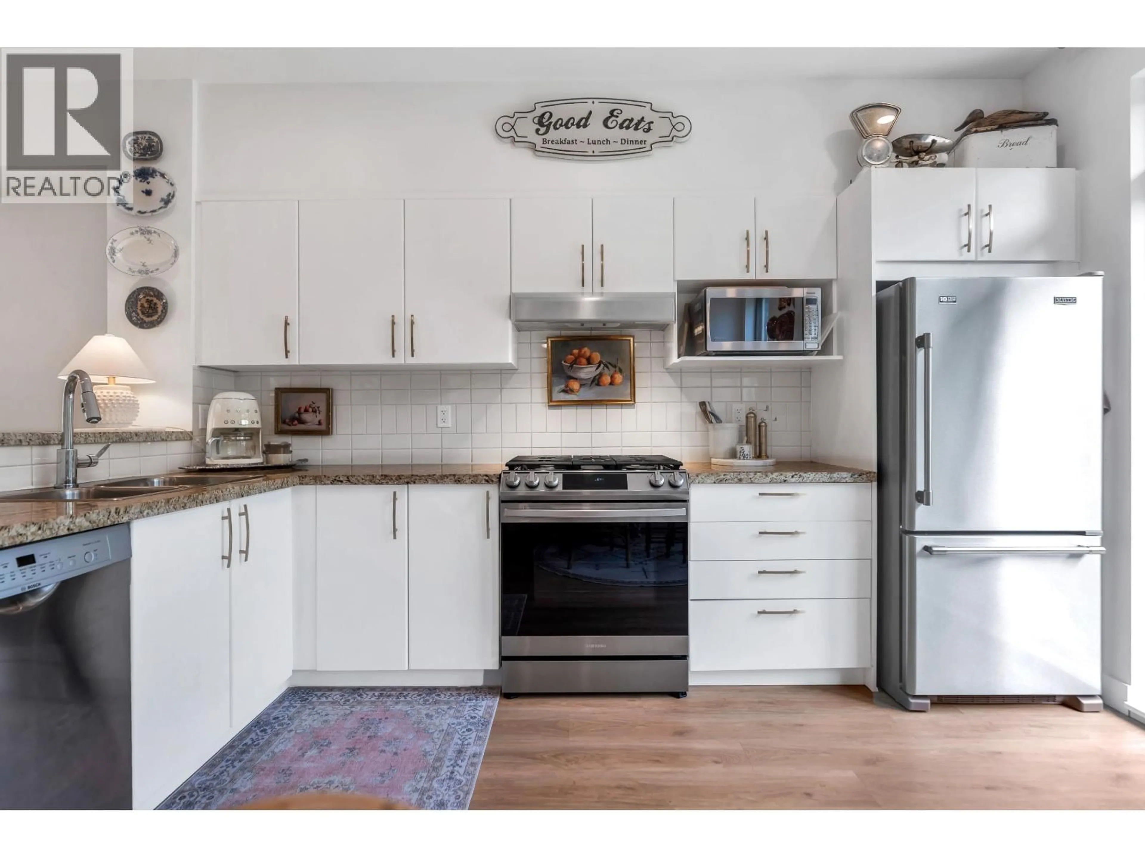 Open concept kitchen, wood/laminate floor for 7 - 301 KLAHANIE DRIVE, Port Moody British Columbia V3H0C2