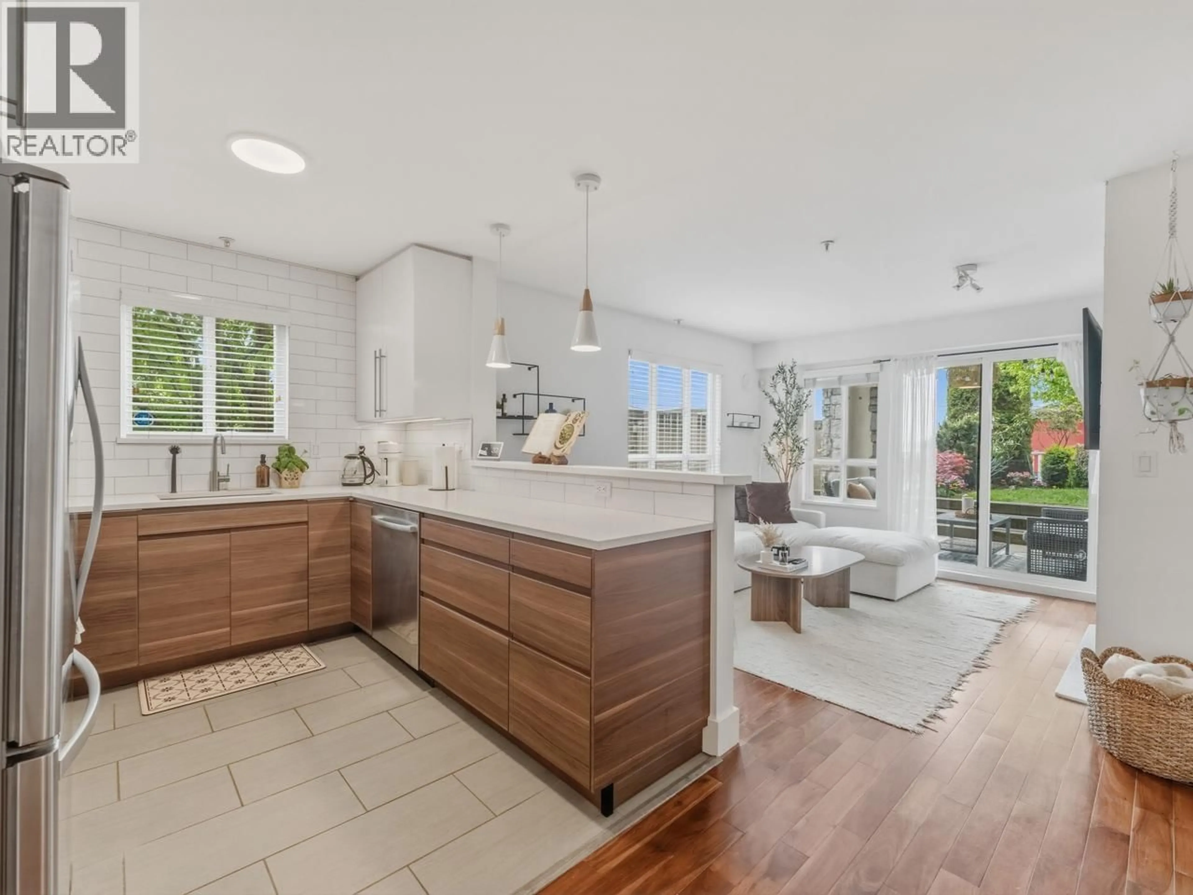 Open concept kitchen, unknown for 104 - 365 1ST STREET, North Vancouver British Columbia V7L4W5