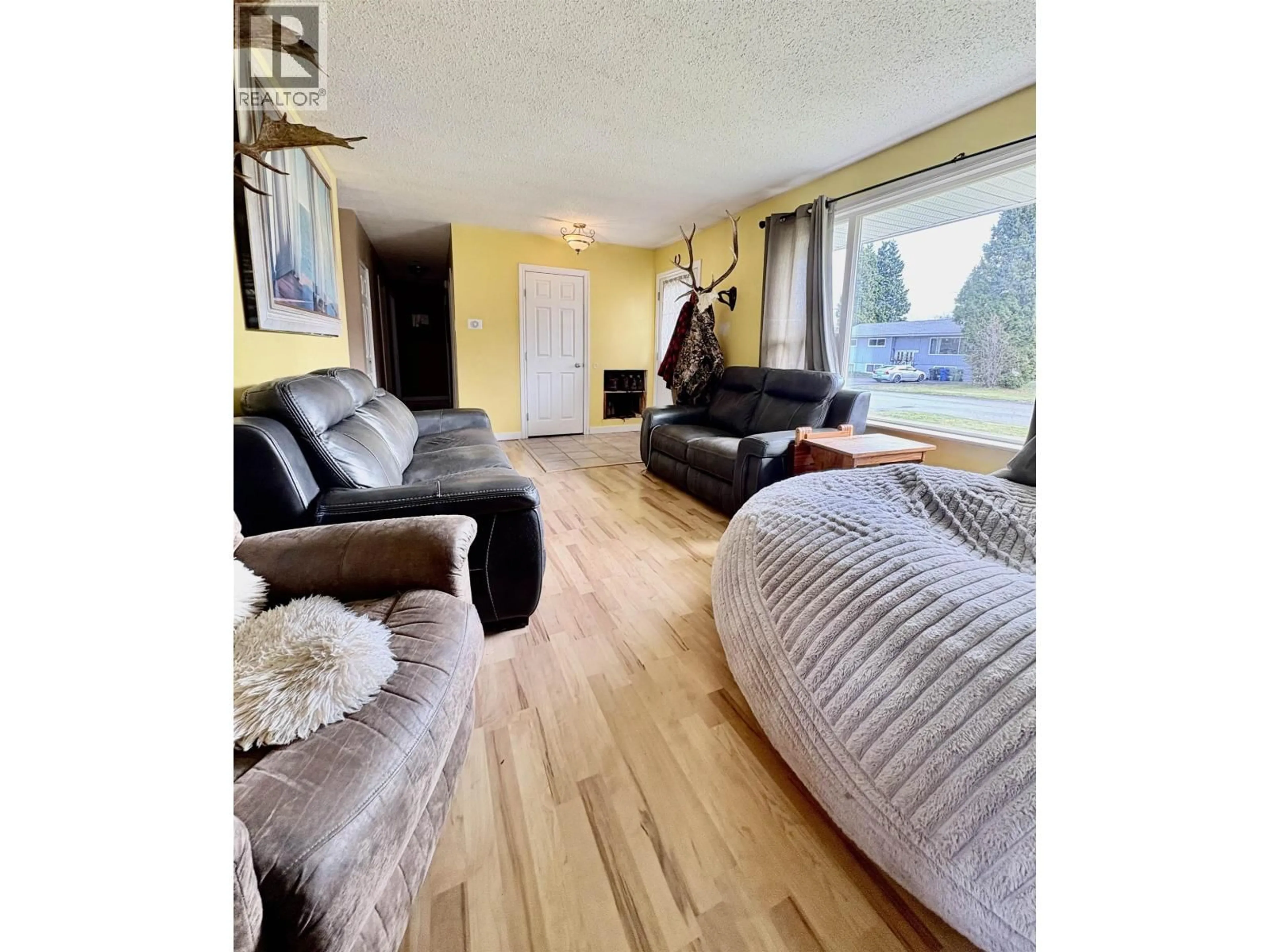 Living room with furniture, wood/laminate floor for 2307 EVERGREEN STREET, Terrace British Columbia V8G4S6